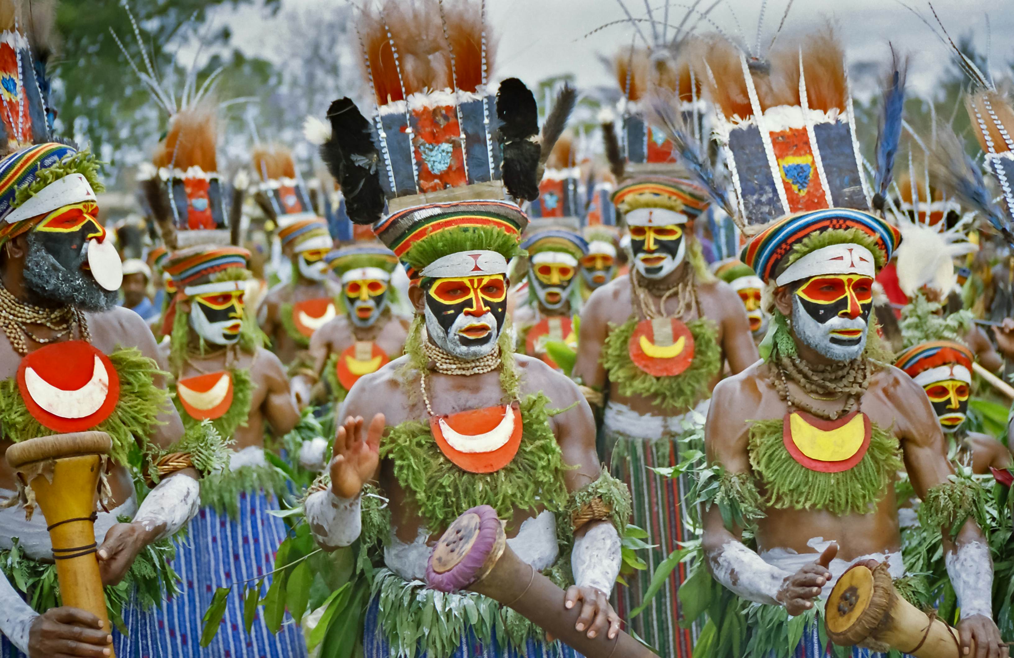 A group of warriors from a tribe in the highlands of Papua New Guinea dance at the Goroka Show.