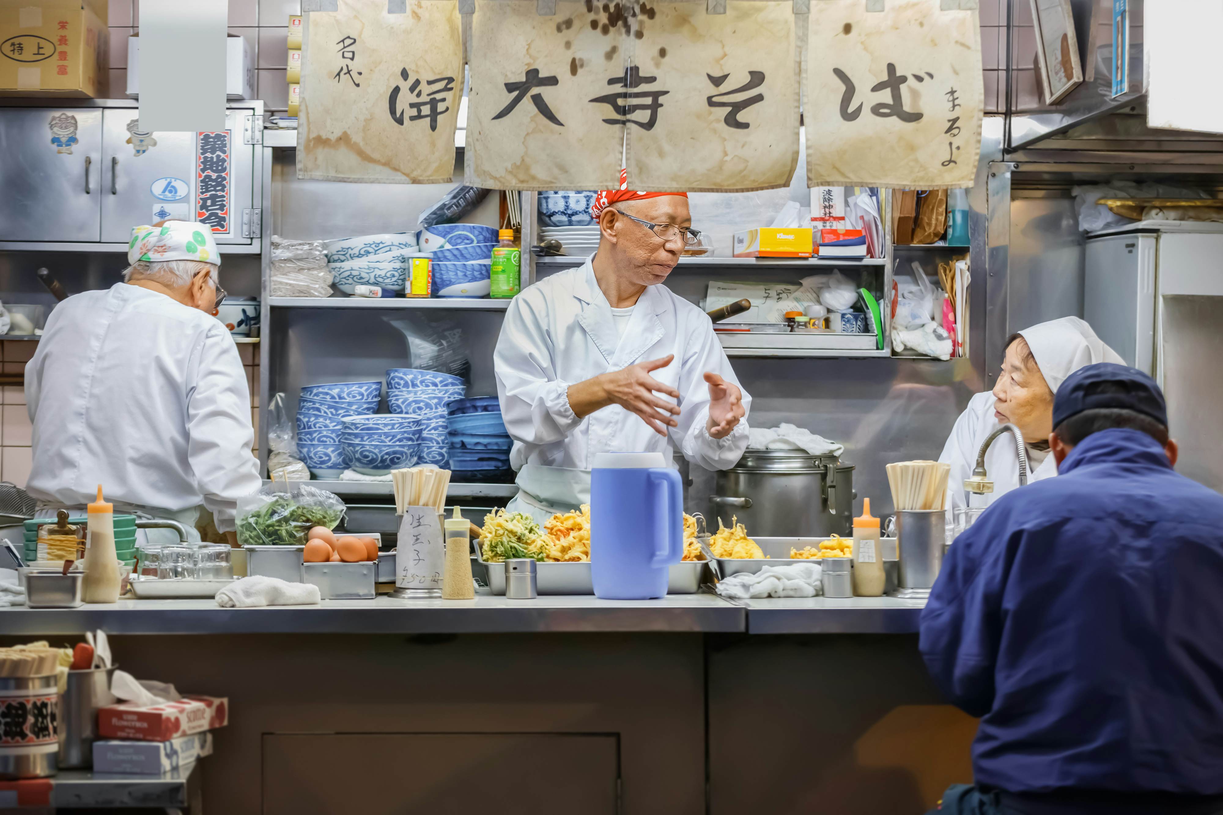 Tsukiji fish market in Tokyo, Japan. Japanese food stall openned early in the morning for people who purchases food here