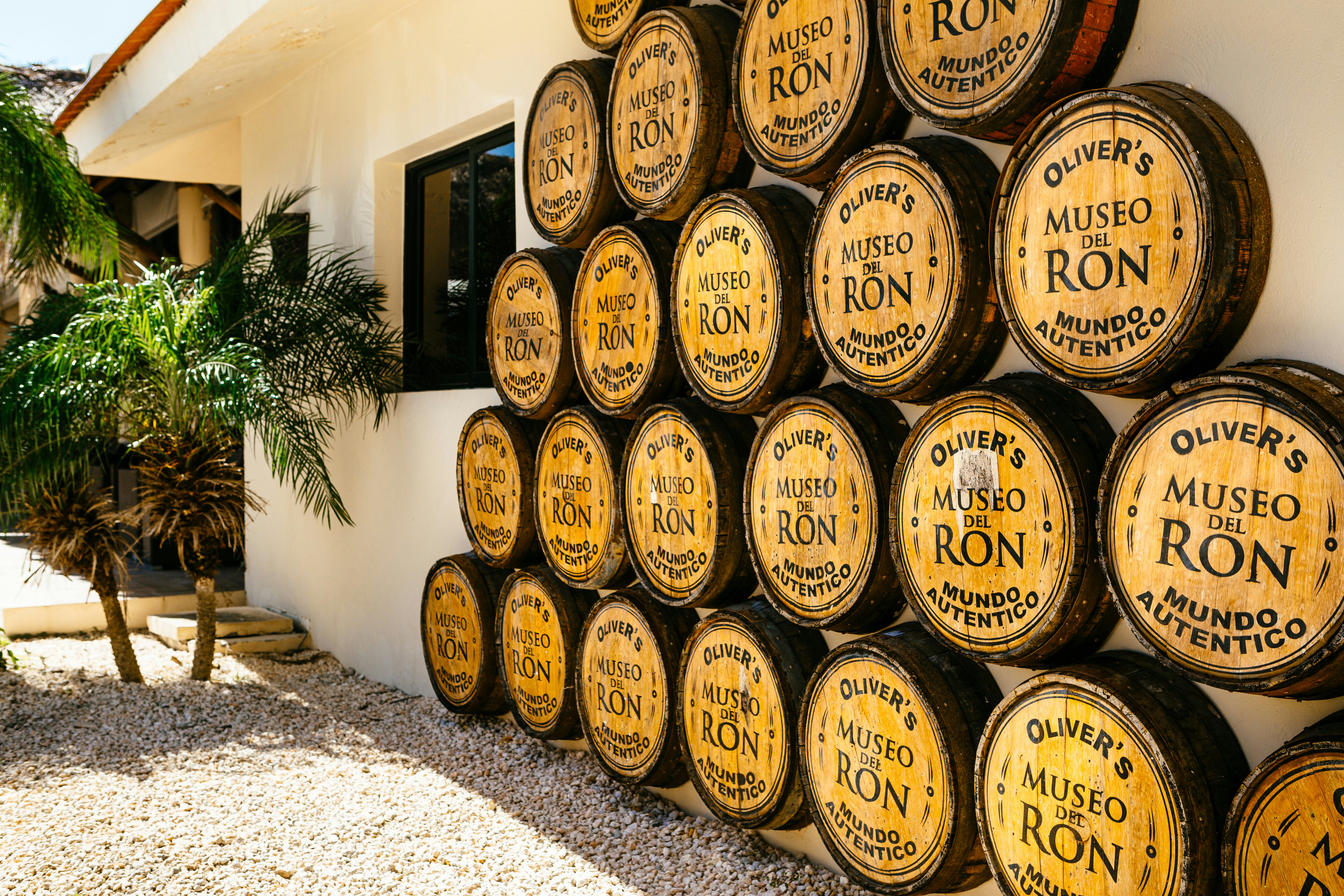 A wall decorated with rum barrels in Punta Cana, Dominican Republic.