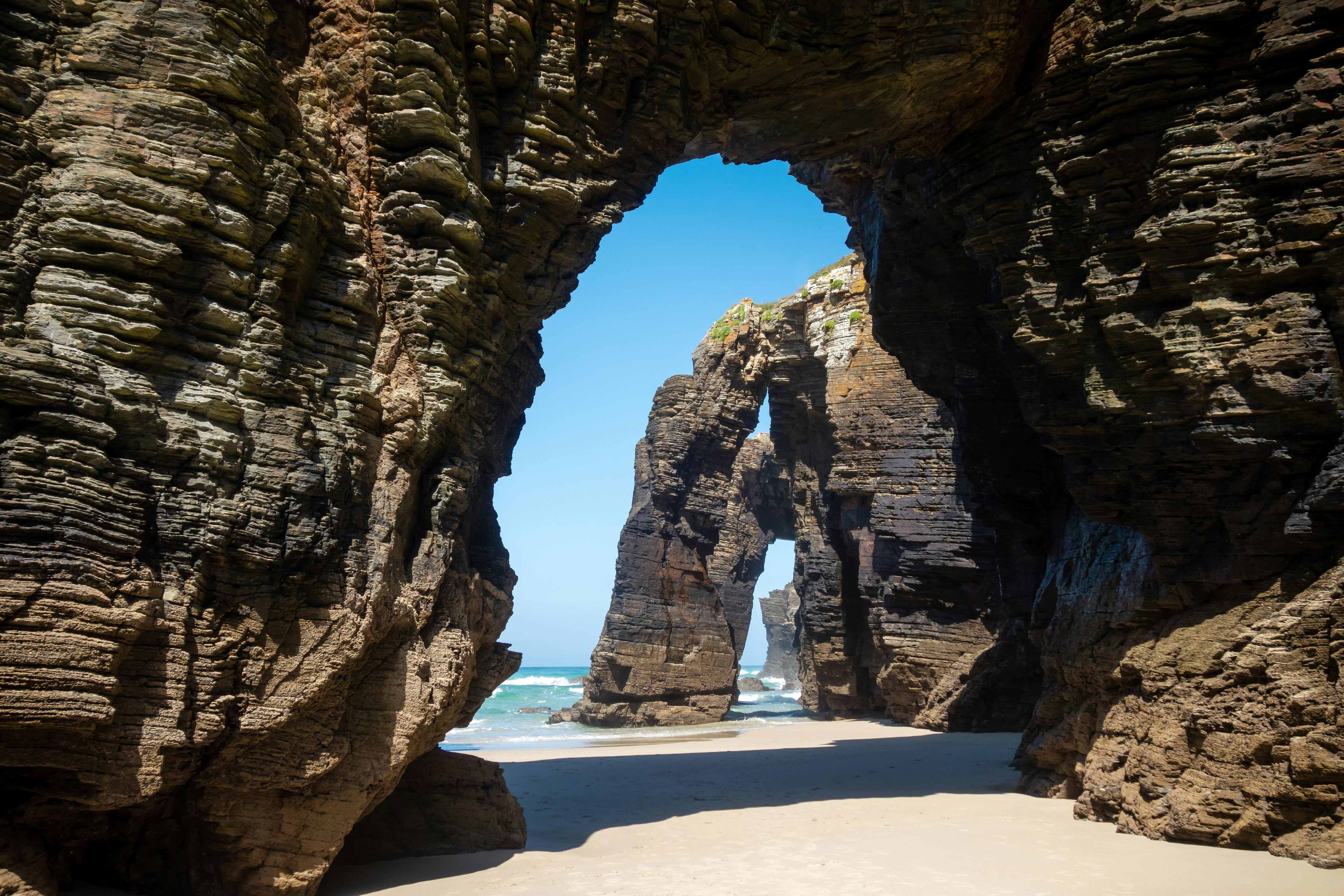 Rock arches at Beach of the Cathedrals in Galicia, Spain.