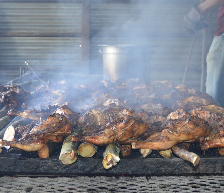 Jerk meat cooked over charcoal in Jamaica