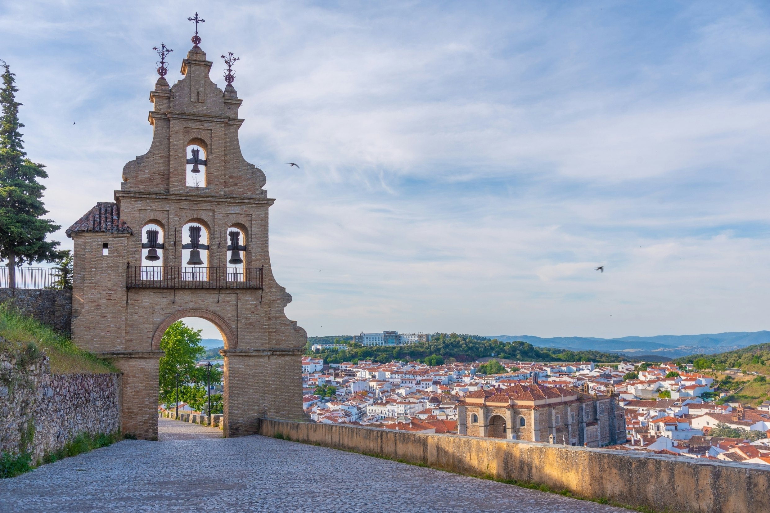 Bell gate leading to the castle in Spanish town Aracena