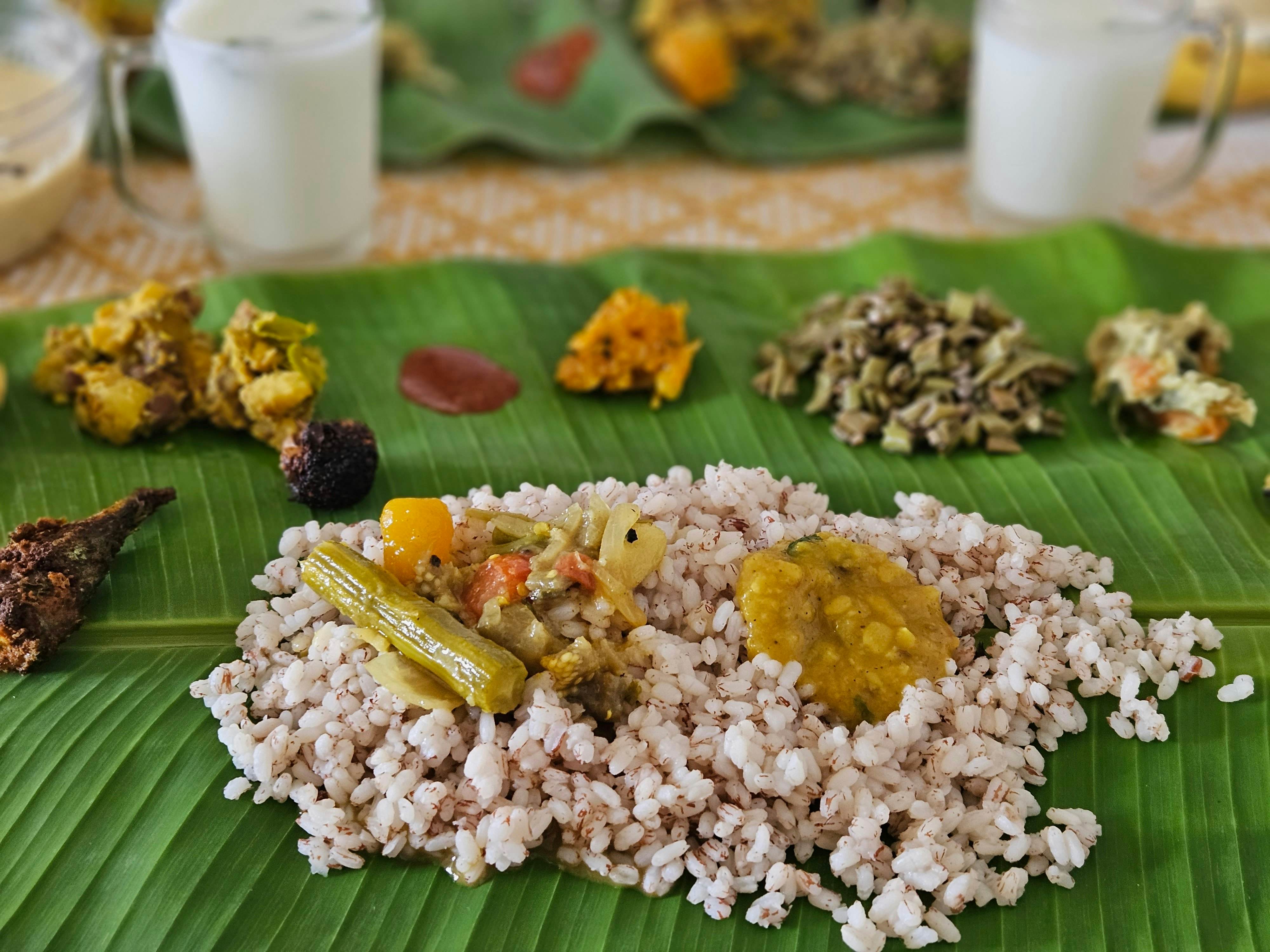 A traditional vegetarian banquet served on a banana leaf in Kerala, India