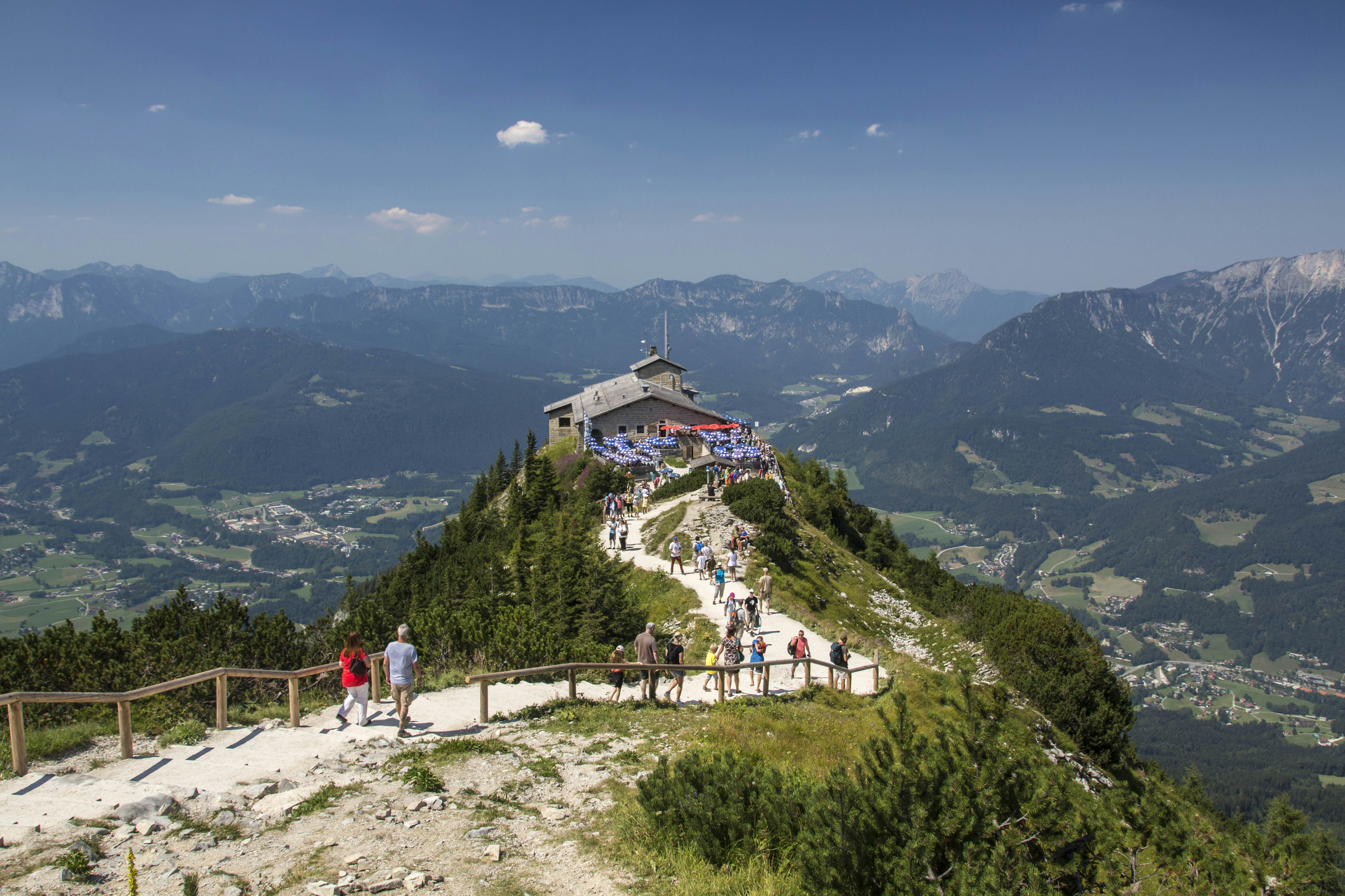 Walkers approach the Kehlsteinhaus (also known as the Eagle's Nest) above Berchtesgaden, Bavaria, Germany.