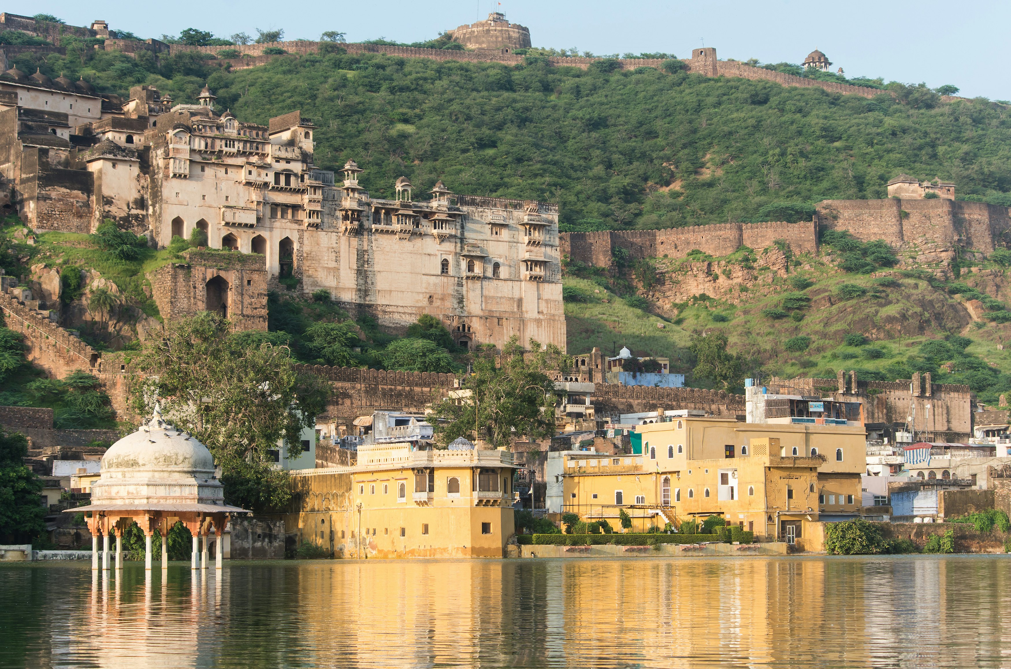 A waterside fortress built into the side of a cliff