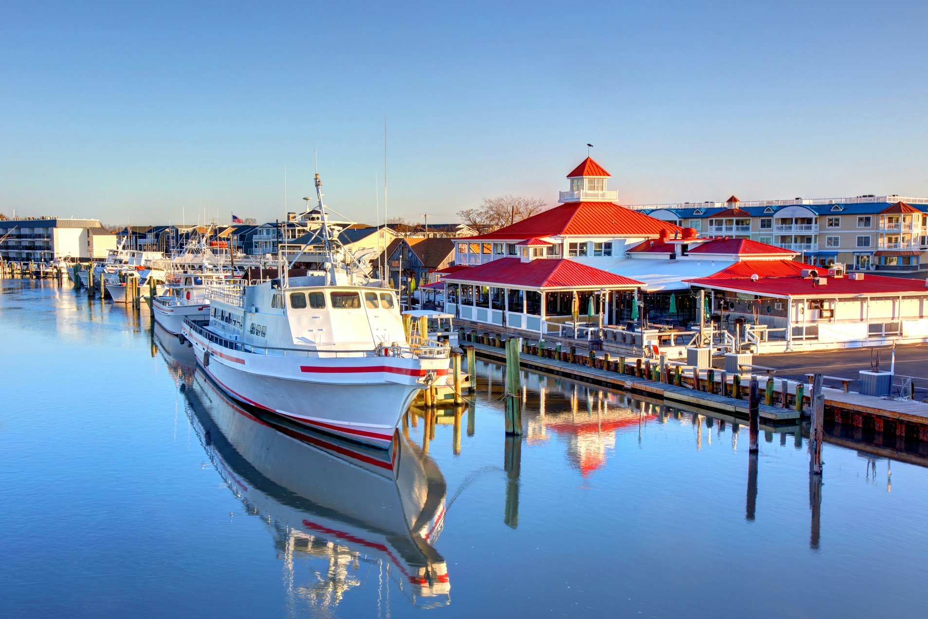 A river scene with moored boats in Lewes, Delaware.