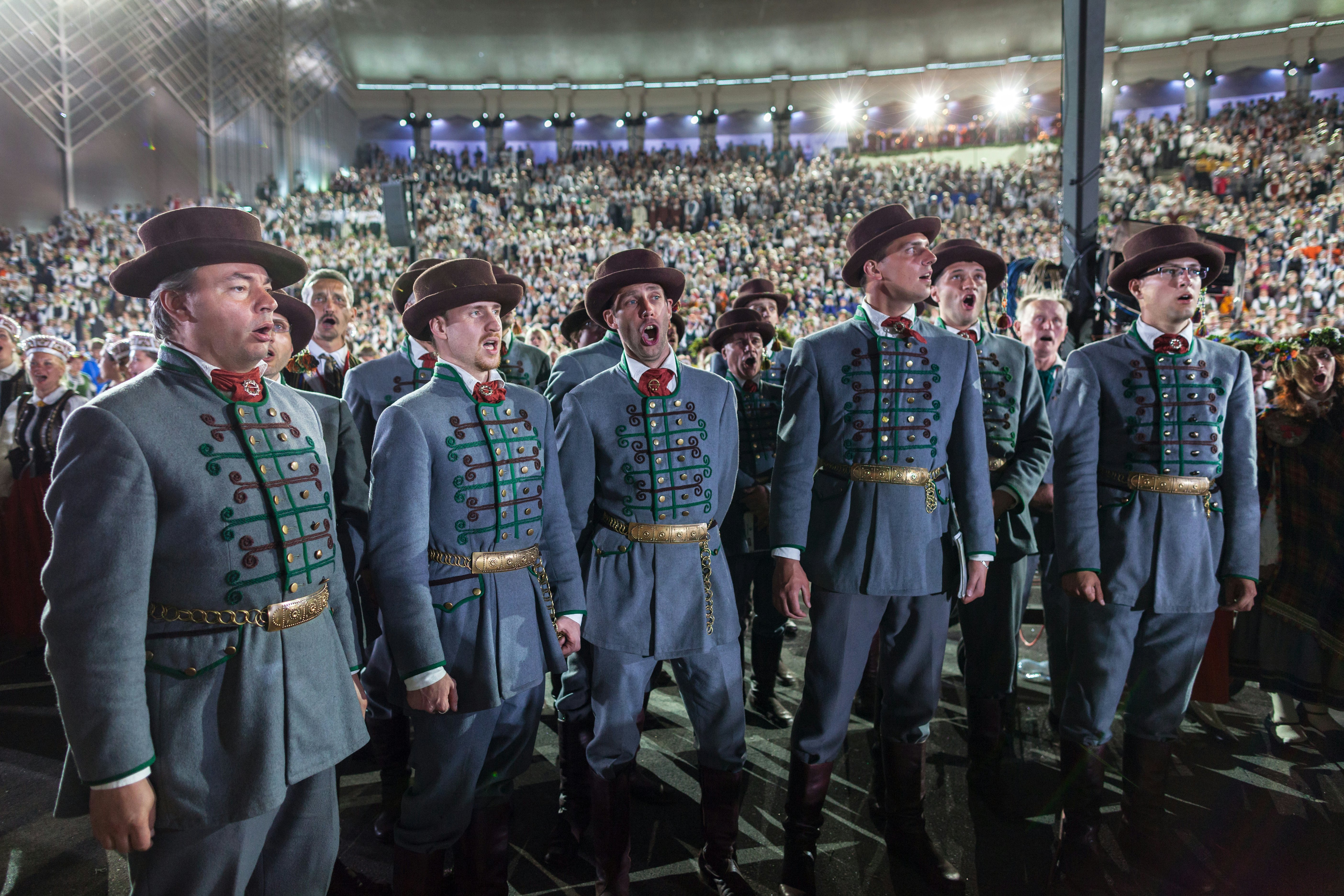 A choir in period costume sings at the Latvian Song Festival in Mežaparks in Rīga.