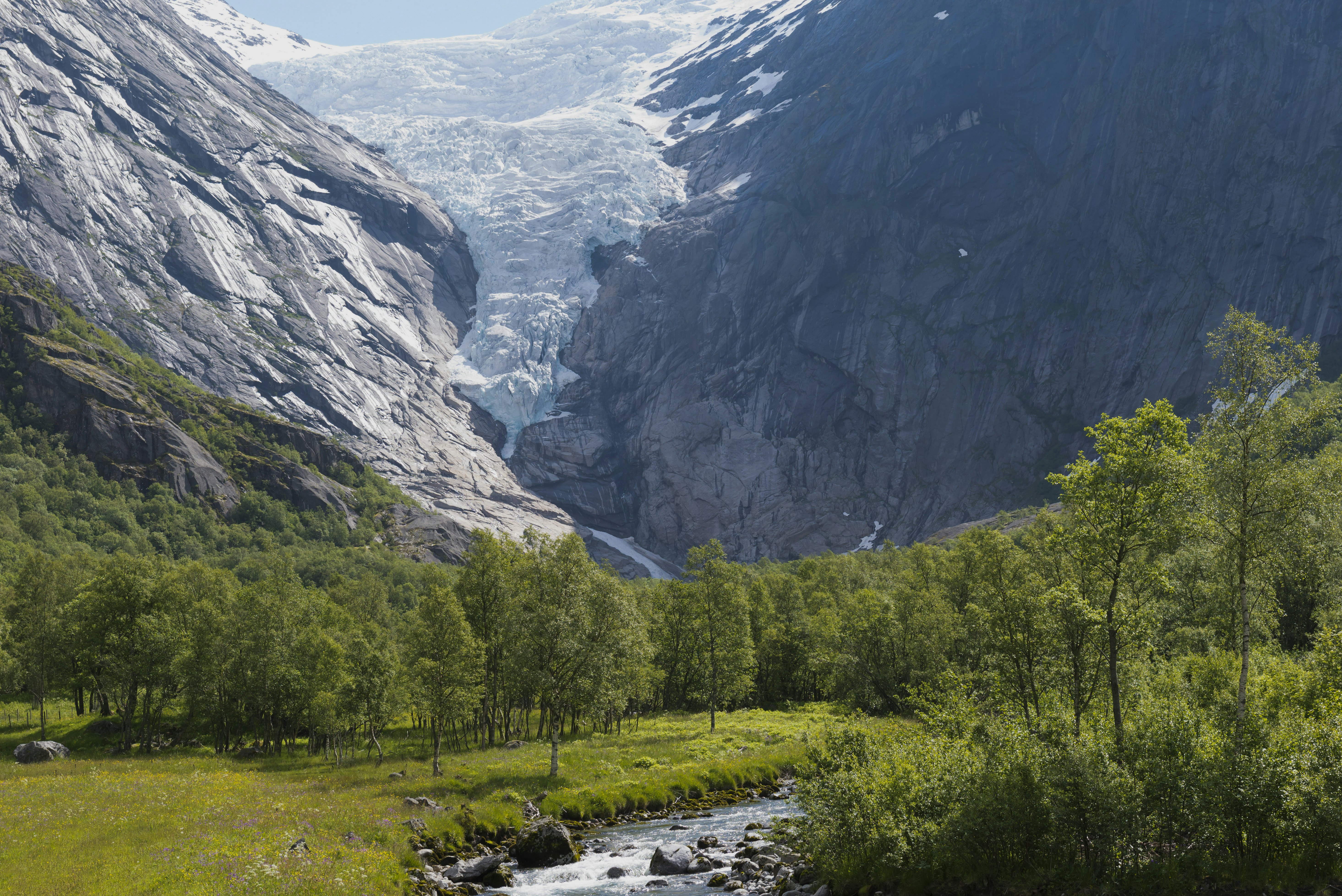 Briksdalen; Briksdalsbreen Glacier; Cliff; Cold Temperature; Glacier; Hiking; Hill; Jostedal; Jostedalsbreen National Park; Lake; Landscape; Outdoors; River; Summer; Sun; Sunlight; Uncultivated; Vacations; Valley; Viewpoint; Village; Fjord; Frost; Frozen; Non-Urban Scene; Norway; Norwegian Culture; Oldedalen; Olden; Cultures; Day; Horizontal; Ice; Majestic; Melting; Photography; Rock - Object; Scenics; Tranquil Scene; Travel; Travel Destinations; Water; Environment; Environmental Conservation; Mountain; Mountain Range; Nature; Sky; Snow; Social Issues; Sogn og Fjordane County;
The Briksdal glacier - Olden, Norway