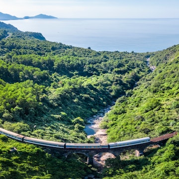 Aerial view of train and railway on Hai Van pass, Bach Ma mountain, Hue, Vietnam License Type: media Download Time: 2022-05-04T03:08:55.000Z User: Is Editorial: No purchase_order: