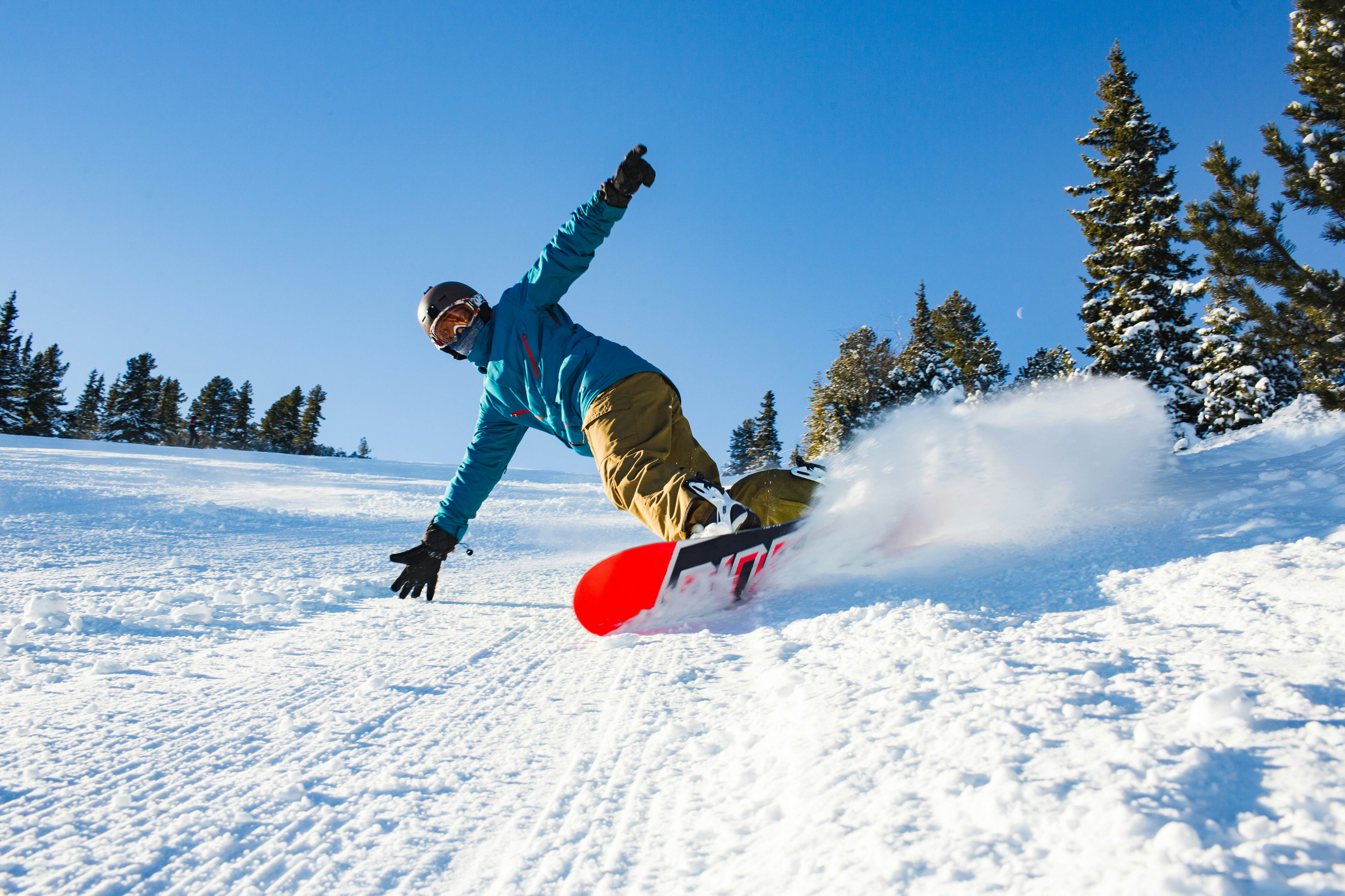 A snowboarder enjoying the pistes at Borovets in Bulgaria.