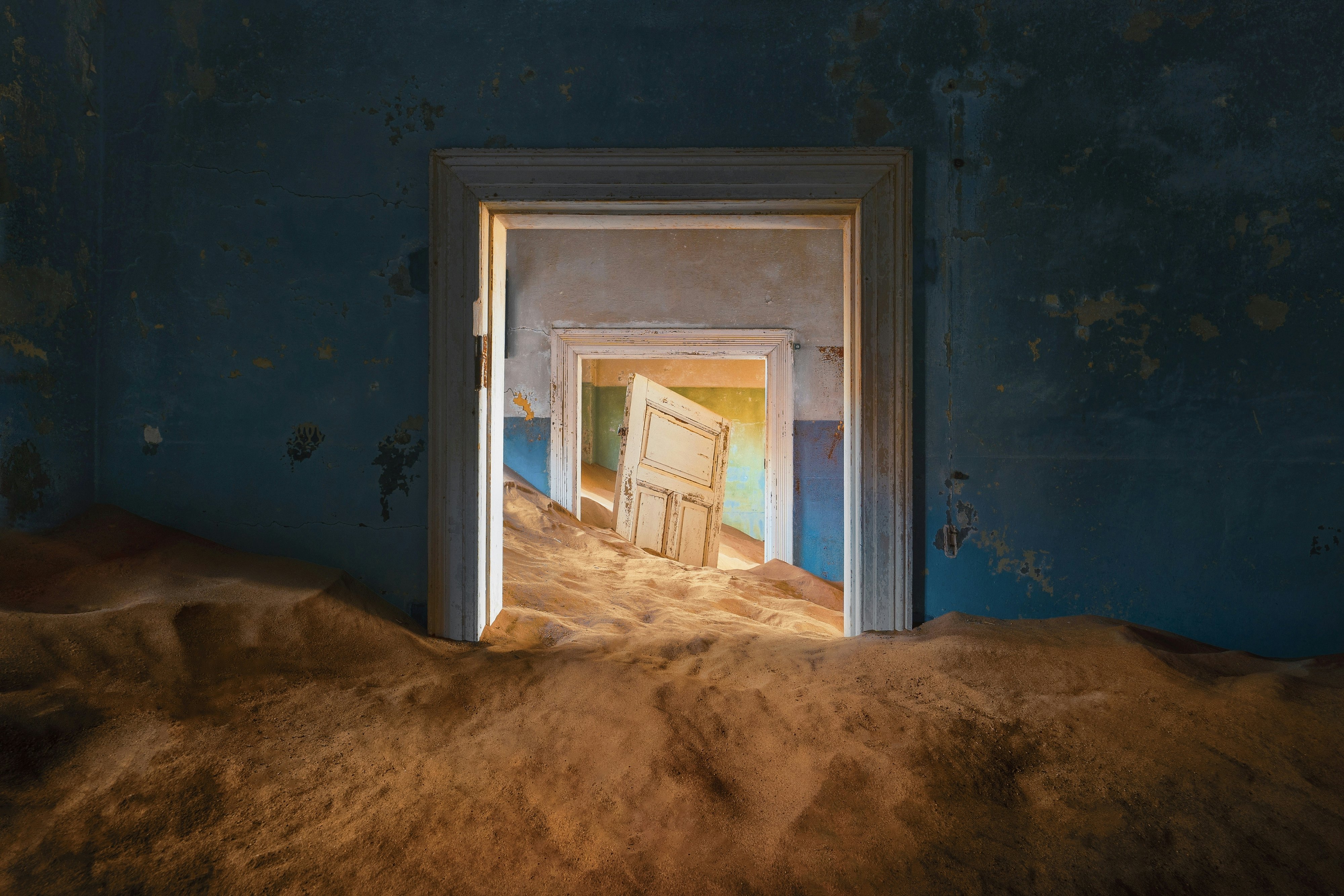 Kolmanskop, The abandoned houses. the famous tourist attraction in Namibia, South Africa. Empty sand dune in home room