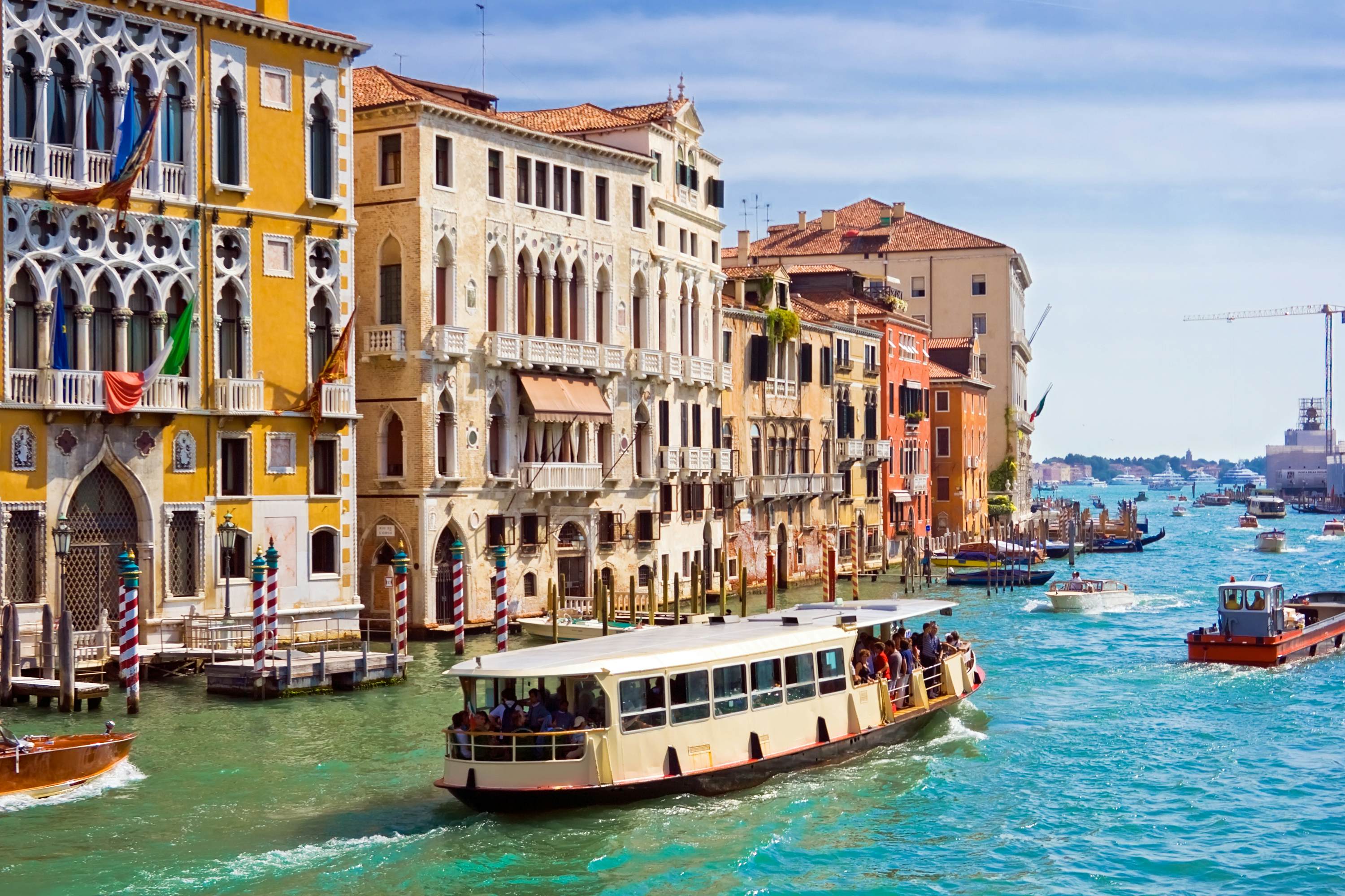 Boat traffic on the Grand Canal in Venice, Italy.