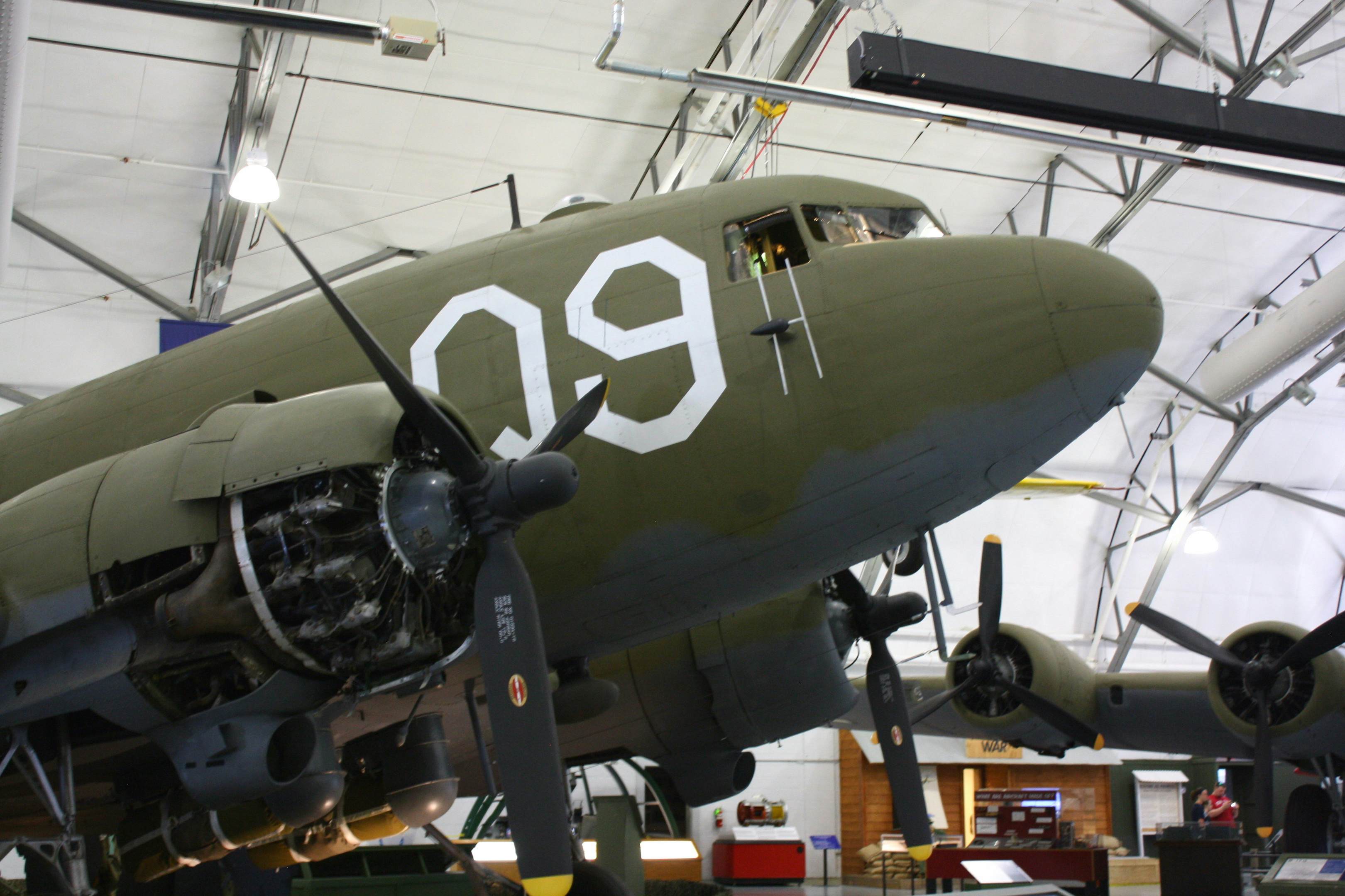 Side view of a C-47A Skytrain aircraft located inside the Air Mobility Command Museum, Dover, Delaware.