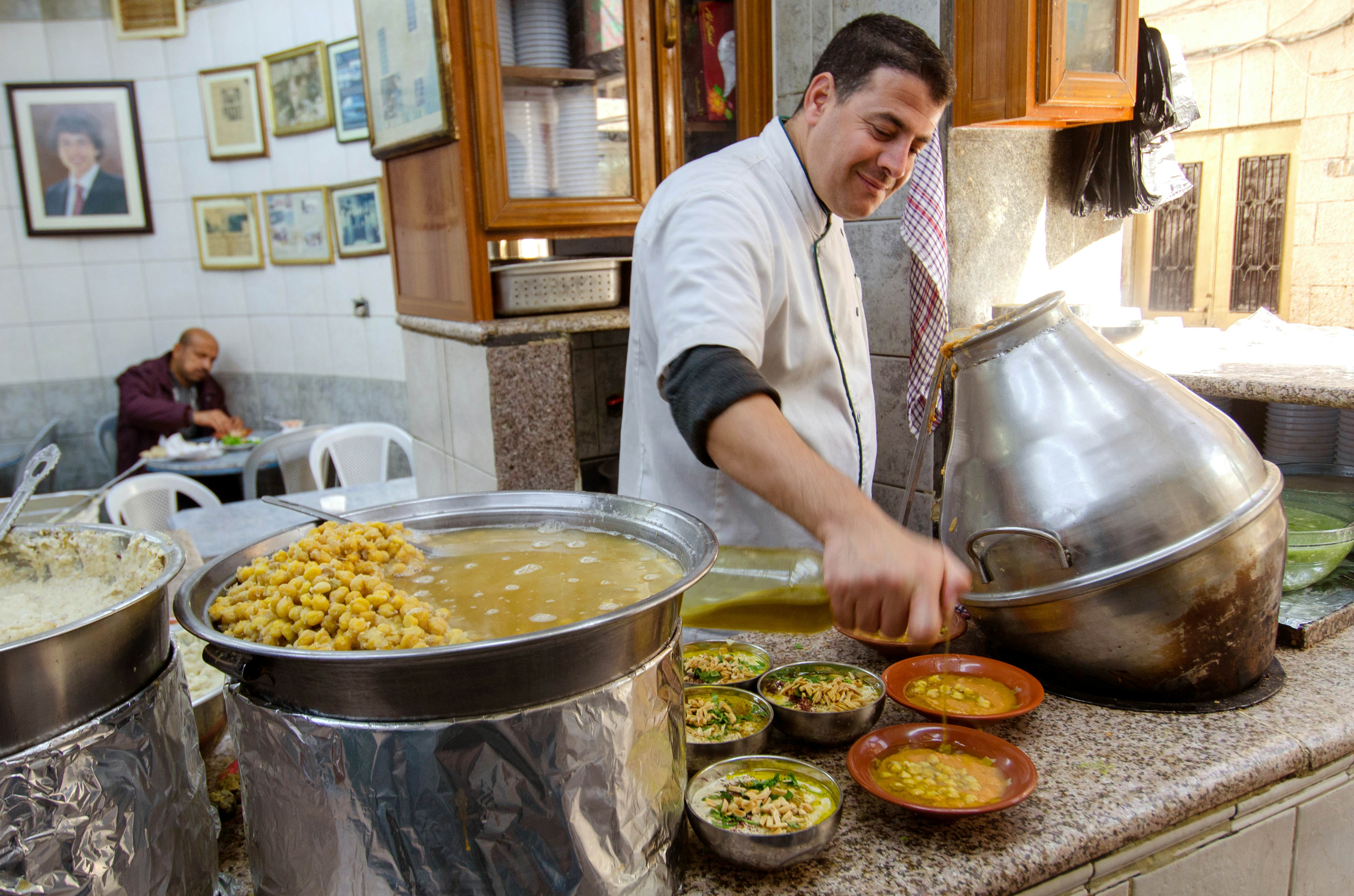 Hashem Restaurant, downtown Amman, Jordan.Fuul, Falafel and Hummus being prepared at the legendary eatery.