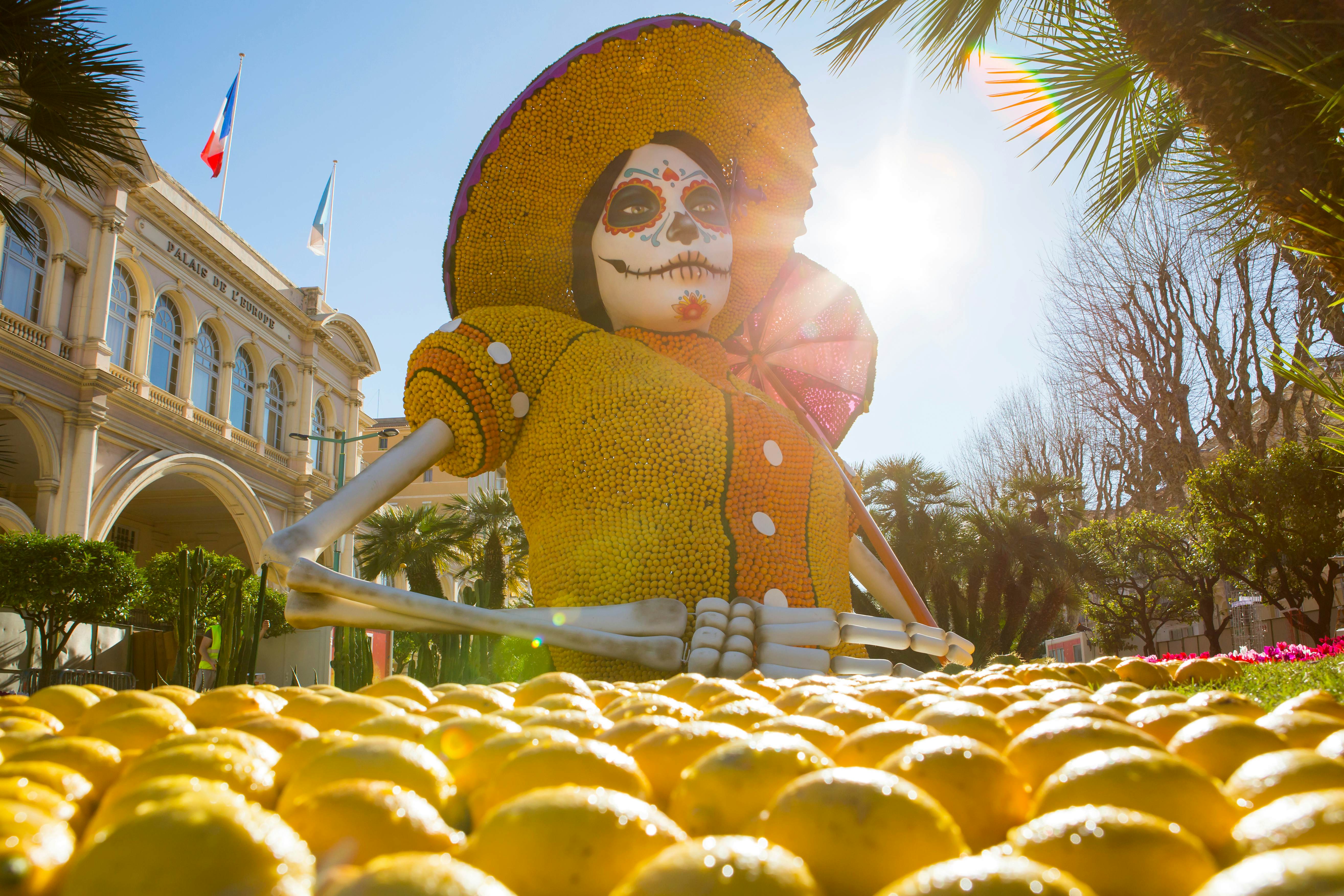 Menton France 02/23/2020 Lemon festival in Menton in the south of France with large lemon statue in the background