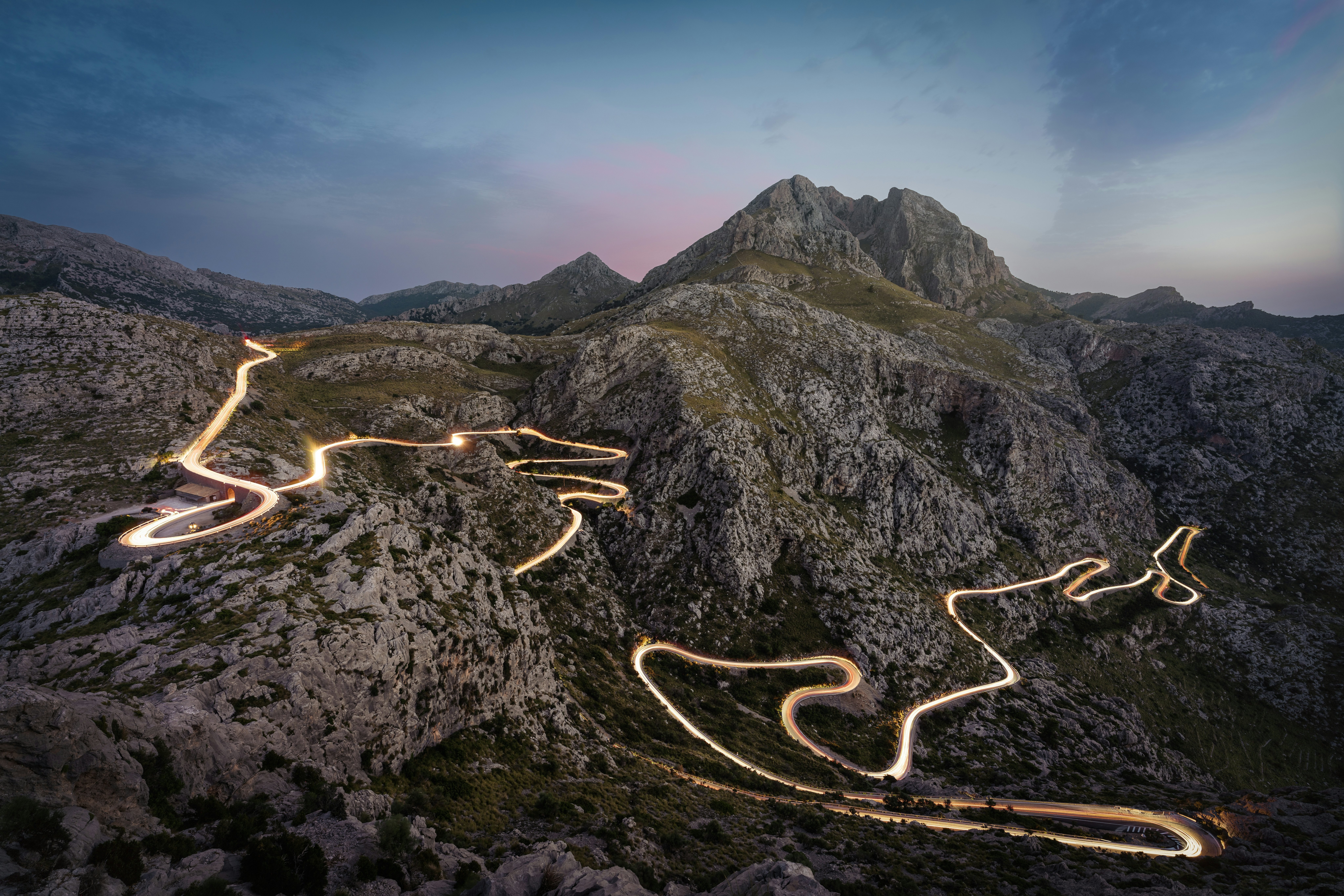 Mountain road with light trails