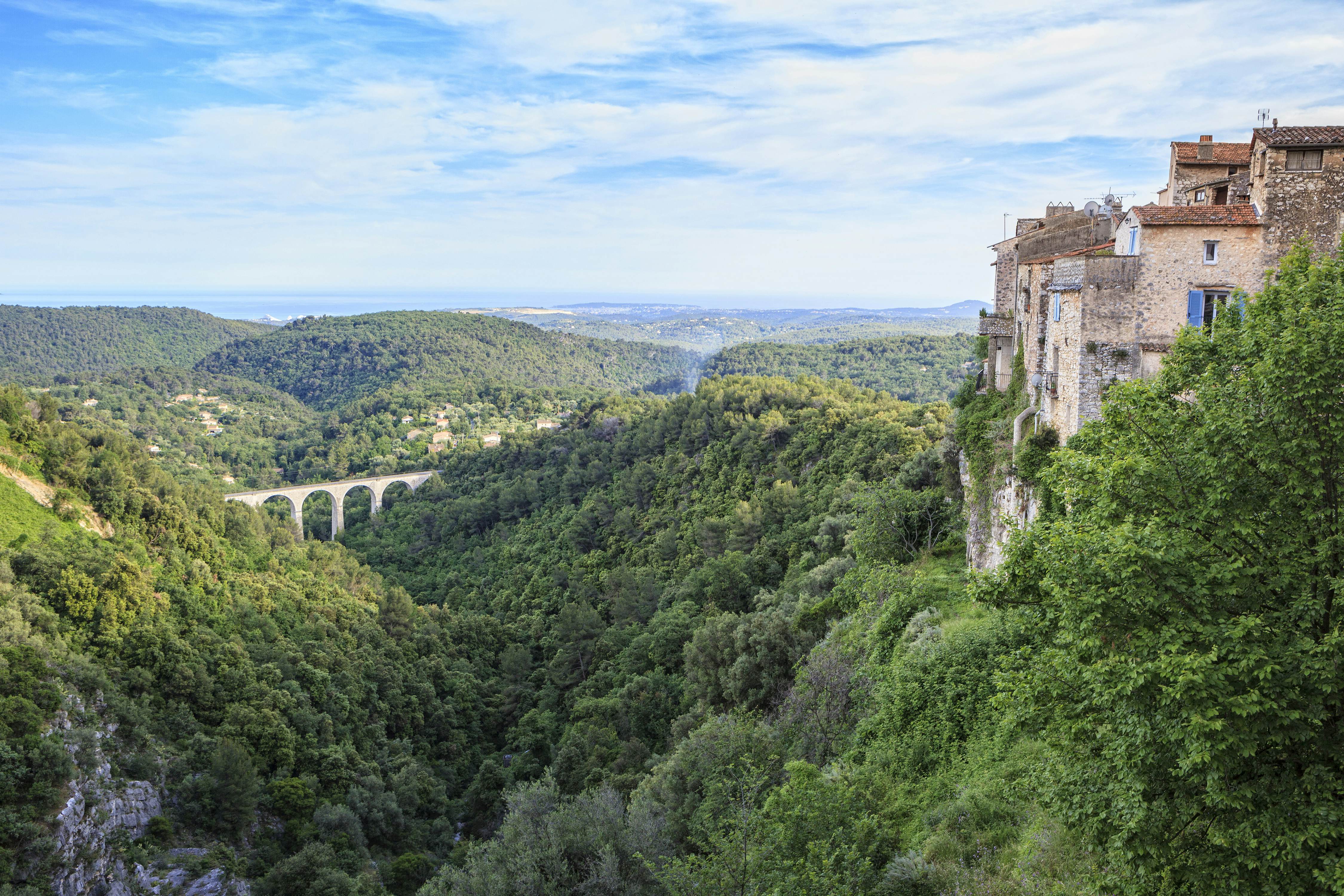 The tree-lined valley and viaduct below Tourettes-sur-Loup.