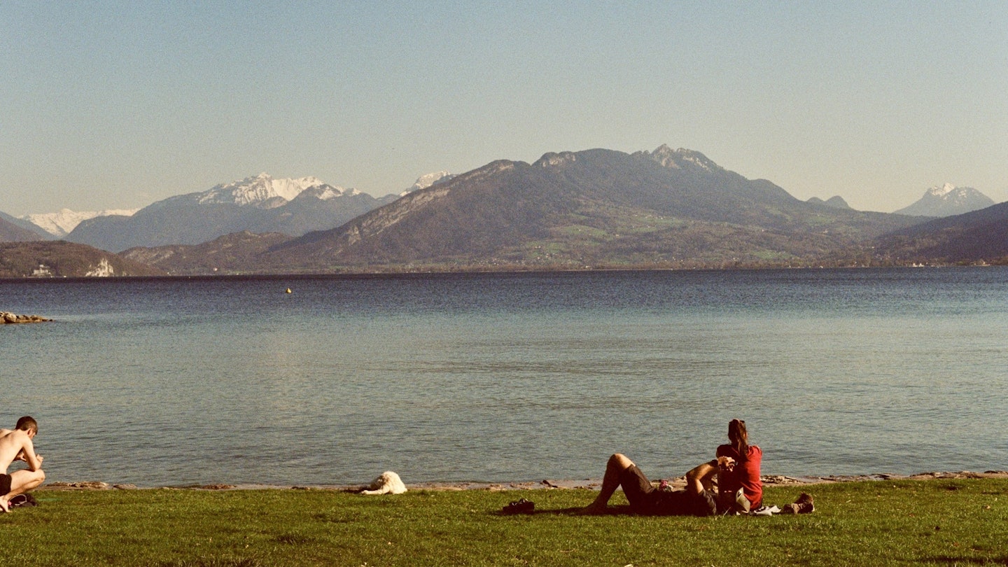 People relax on the waterfront of Lake Annecy in Annecy, France
Adult, Beach, Coast, Female, Grass, Lake, Landscape, Mountain, Mountain Range, Nature, Outdoors, Peak, Person, Scenery, Sea, Shoreline, Water, Woman