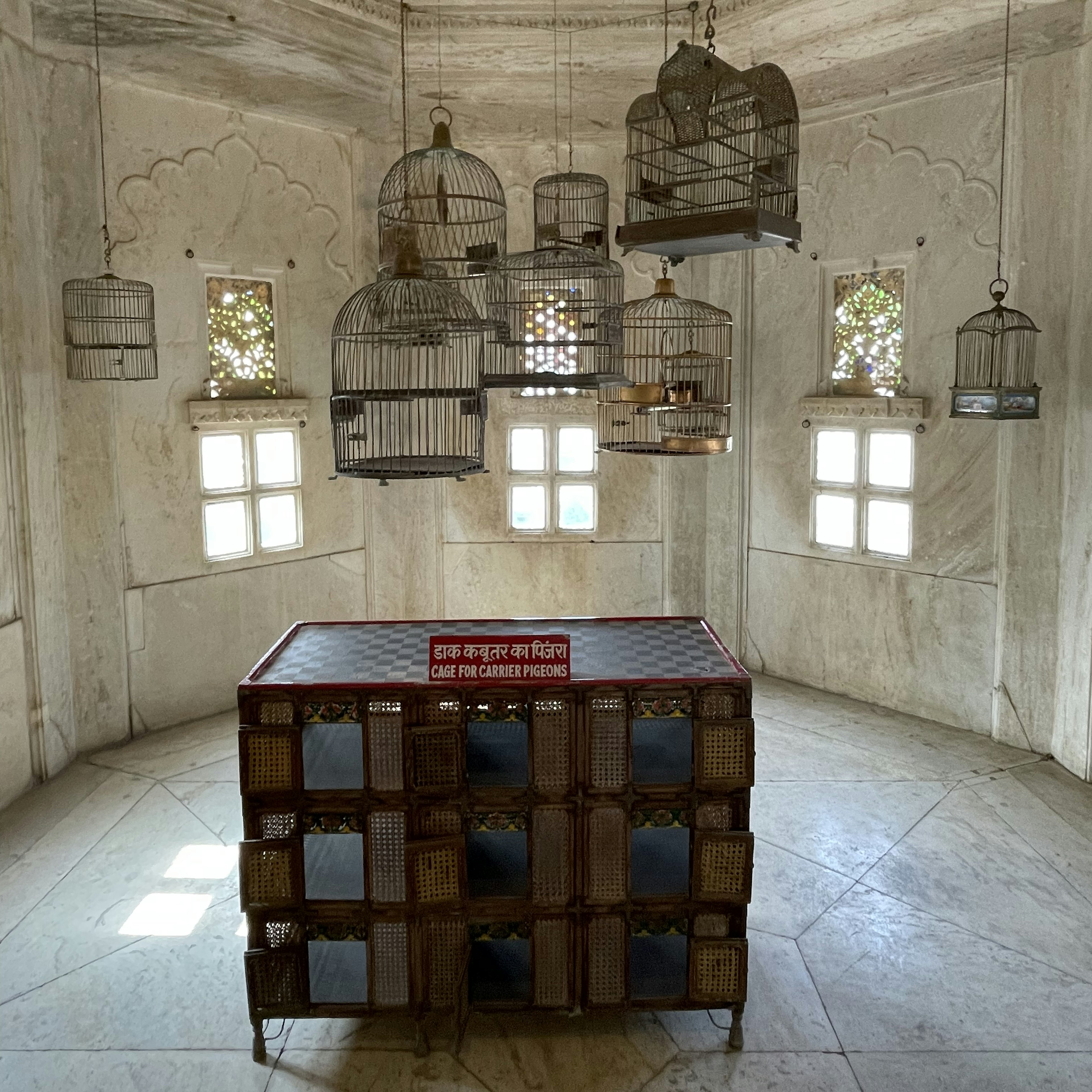 Birdcages on display in the City Palace, Udaipur, Rajasthan, India.