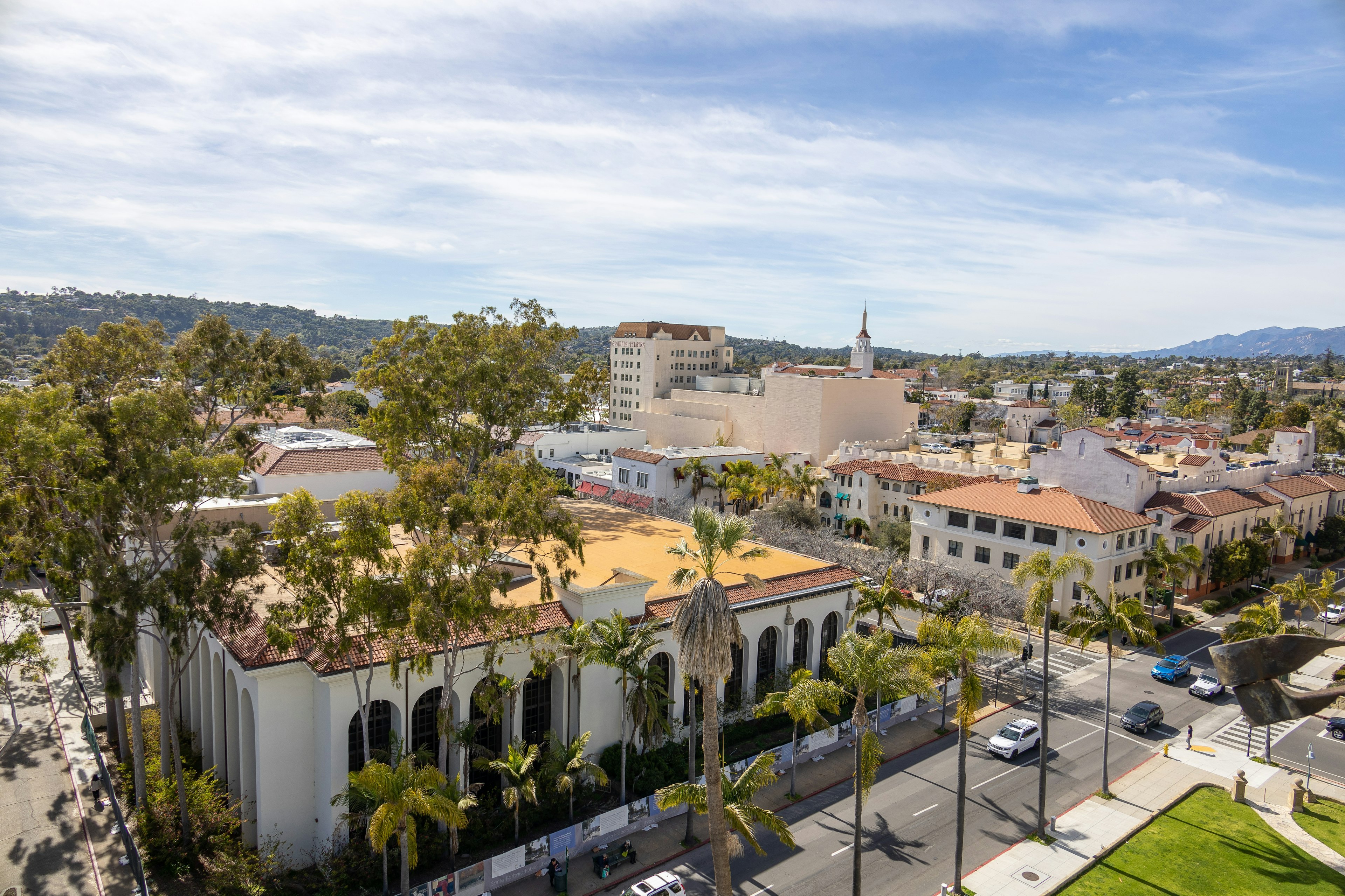 Aerial view of Spanish colonial-style buildings on a sunny day.