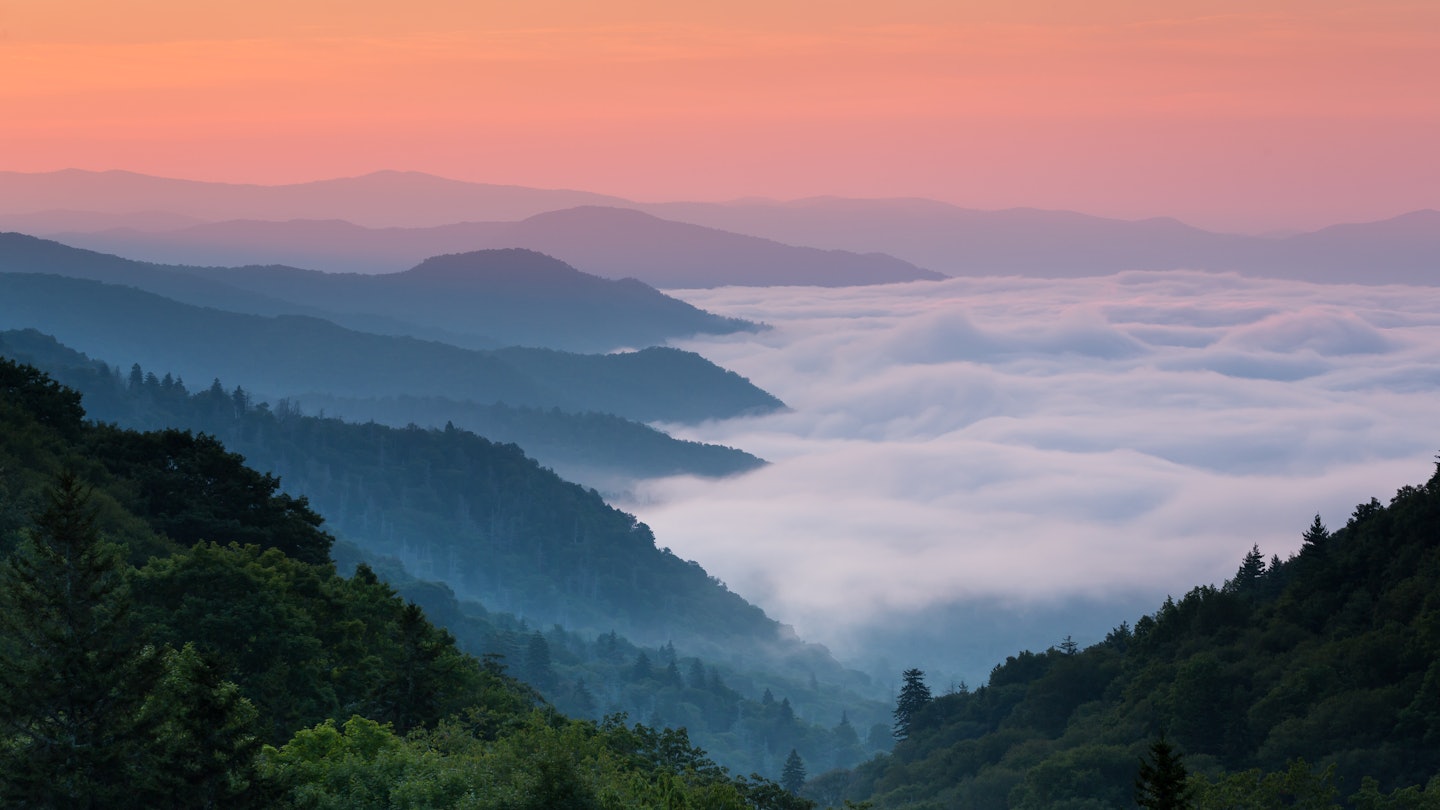 Sunrise at Mills Overlook at Smoky Mountain National Park.
218139799
background, blue, clouds, cloudy, crowed, dark, destination, early, fog, foggy, forest, grass, great, green, landscape, layers, mills, morning, most, mountain, mountains, national, nature, of, orange, outdoor, overlook, park, pink, rainy, red, ridges, saturated, scenic, sky, smoky, spot, sunrise, tennessee, tourist, travel, traveler, usa, visited, white, wild