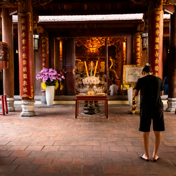 HANOI, VIETNAM — April 13, 2025
Praying in Bach Ma Temple, Hanoi
