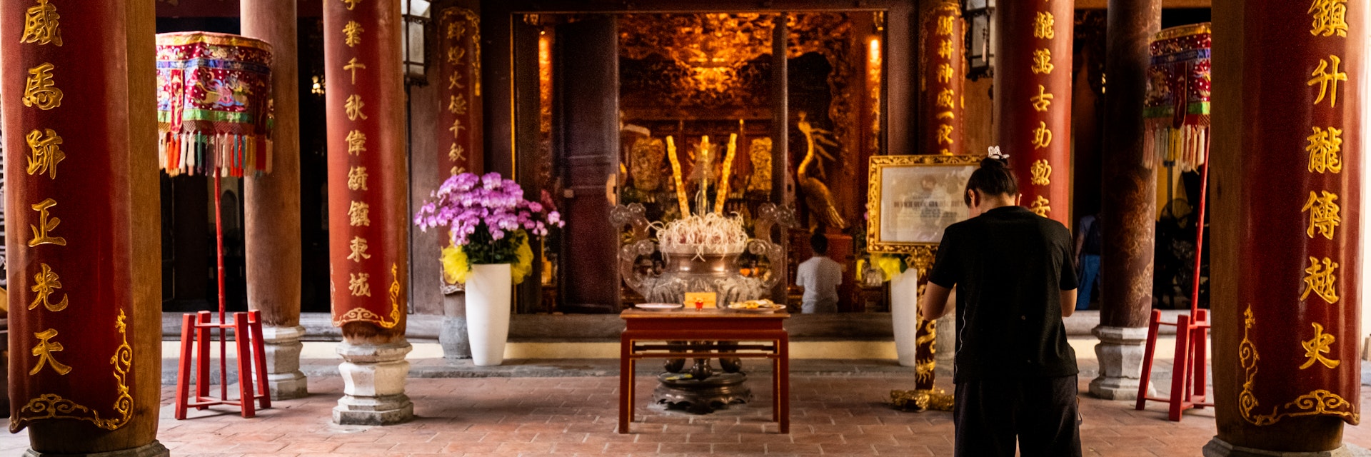 HANOI, VIETNAM — April 13, 2025
Praying in Bach Ma Temple, Hanoi