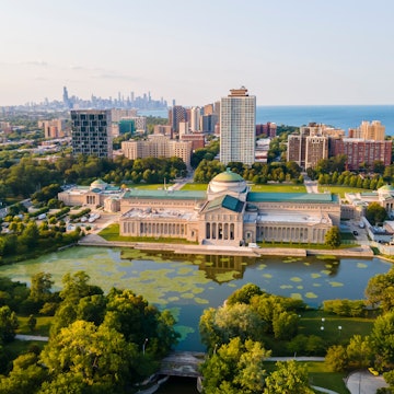 Chicago, IL USA September 16th 2022: Aerial drone footage of the Chicago Museum of Science and industry during the summer time. the view from above is beautiful with the lake water full of life License Type: media Download Time: 2024-04-17T07:13:51.000Z User: Is Editorial: Yes purchase_order: