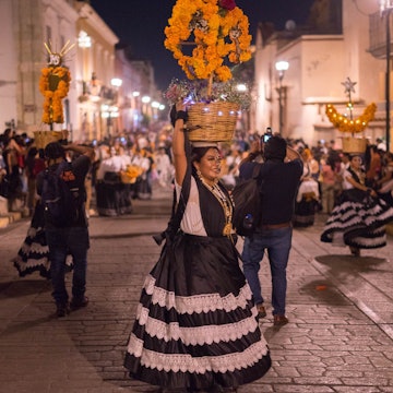 Oaxaca de Juarez, Oaxaca, Mexico-October 28 2022 : traditional day of the dead parade in Oaxaca city streets with traditional costume and catrina's make up., License Type: media, Download Time: 2025-05-05T19:18:43.000Z, User: rhylton_redventures, Editorial: true, purchase_order: 65050 - Digital Destinations and Articles, job: Lonely Planet, client: Indigenous Mexico, other: Rhianydd Hylton