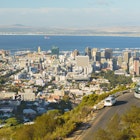 474033432
Horizon Over Land, Malay Quarter, Travel, Tourism, Photography, Building Exterior, No People, Western Cape Province, Downtown District, Coastline, Color Image, Skyscraper, Victoria and Alfred Waterfront, Table Bay, Scenics, Waterfront, Architecture, Travel Destinations, Transportation, Urban Scene, Outdoors, Panoramic, Horizontal, Cape Town, South Africa, Africa, Bay Horse, Day, Summer, Cliff, Table Mountain South Africa, Mountain, Hill, Horizon, Landscape, Atlantic Ocean, Sea, Street, Road, Formal Garden, Built Structure, Urban Skyline, Cityscape, City, Coach Bus, Bus, Car, House
Cape Town view from the road on Table Mountain. - stock photo
Cape Town cityscape seen from the road leading to Table Mountain cable car station (South Africa).