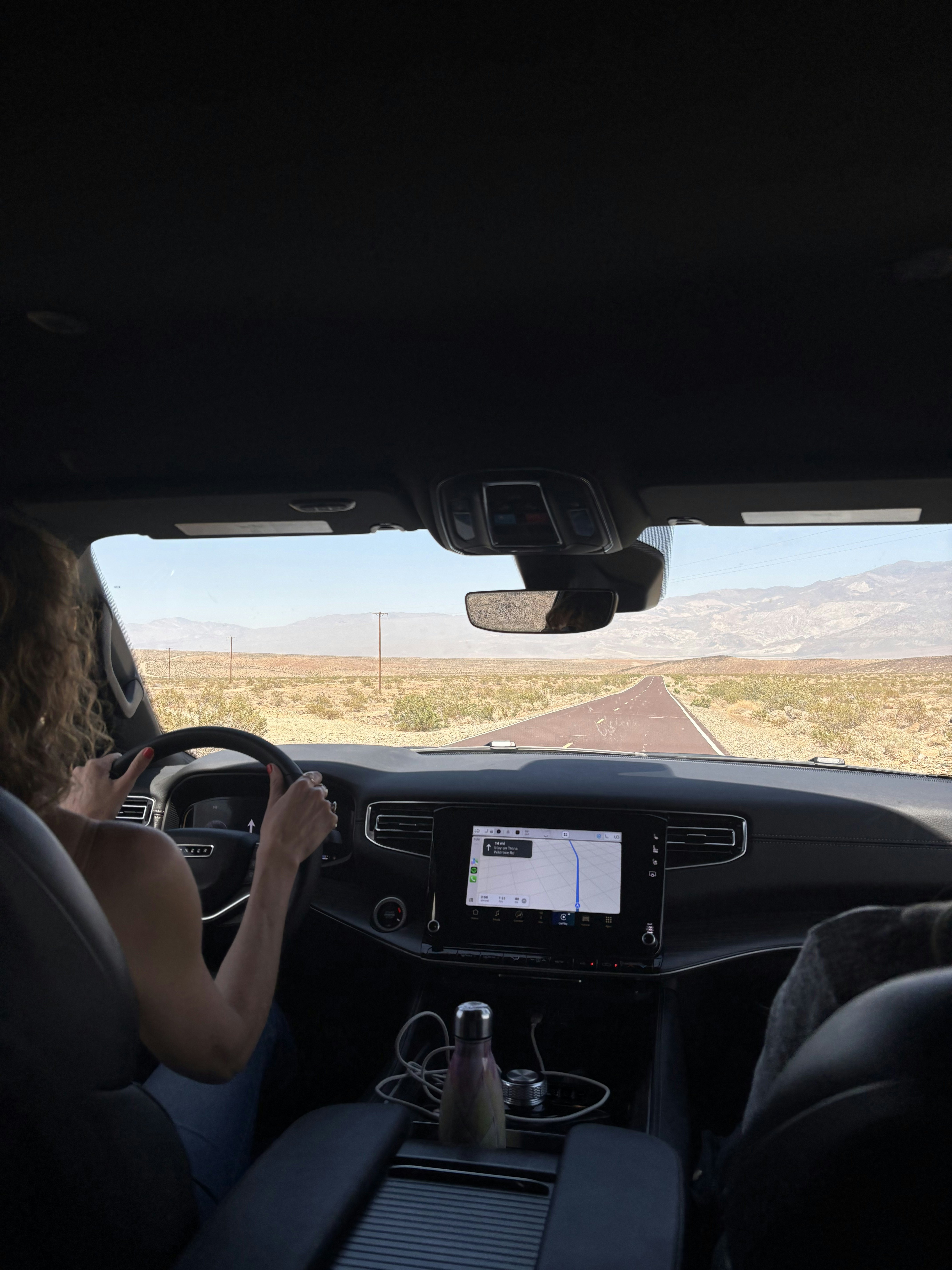 Woman driving through Death Valley