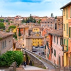 Perugia, Umbria / Italy - 2018/05/28: Panoramic view of the historic aqueduct forming Via dell Acquedotto pedestrian street along the ancient Via Appia street in Perugia historic quarter , License Type: media, Download Time: 2024-11-16T14:07:50.000Z, User: nic.dhoedt_lonelyplanet, Editorial: true, purchase_order: 56530 - Guidebooks, job: Global Publishing Wip, client: Lonely Planet Italy 17, other: Nicolas D'Hoedt