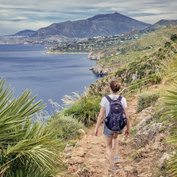 Zingaro, Italy - May 9, 2019: Tourist on a trail in Zingaro natural reserve on the shore of Castellammare Gulf on Sicily Island
2118184367
bioreserve, castellammare, coast, coastline, conserve, footpath, footway, gulf, island, isle, italian, italy, landscape, natural, nature, park, path, pathway, preserve, reserve, scene, scenery, scenics, sea, seascape, seashore, seaside, sicilia, sicily, tourist, trail, trekking, walking, water, wilderness, woman, zingaro, italian republic, landscape park, mediterranean sea, national park, nature park, riserva dello zingaro, sicily island, tyrrhenian sea, zingaro reserve, Adventure, Agavaceae, Bag, Female, Girl, Hiking, Nature, Outdoors, Person, Shorts, Summer, Teen
Zingaro, Italy: Tourist on a trail in Zingaro natural reserve on the shore of Castellammare Gulf on Sicily Island
