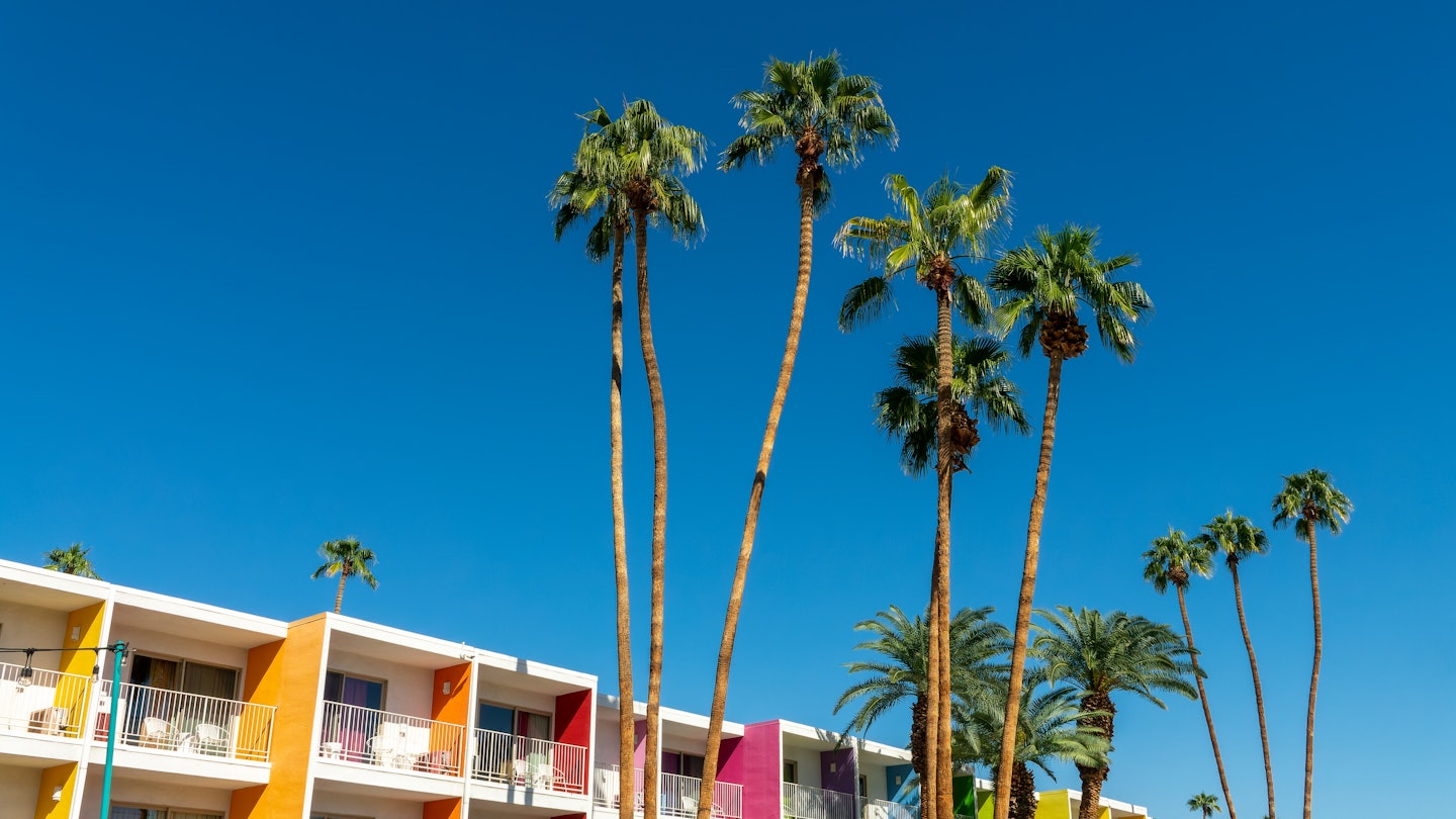 PALM SPRINGS, CALIFORNIA - OCTOBER 16, 2022: Saguaro hotel, palm trees and colorful architecture in Palm Springs, California, License Type: media, Download Time: 2025-02-28T21:26:31.000Z, User: katelyn.perry_lonelyplanet, Editorial: true, purchase_order: 65050 - Digital ÌÇÐÄ´«Ã½ and Articles, job: wip, client: wip, other: Katelyn Perry
