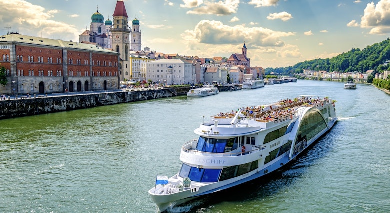 Passau, Germany - June 11: historic buildings and ship at the famous old town of Passau on June 11, 2023; Shutterstock ID 2329711047; purchase_order: 65050 - Digital Destinations and Articles; job: Lonely Planet Online Editorial; client: Best river cruises in Europe; other: Brian Healy
2329711047
architecture, bavaria, bridge, cathedral, center, church, city, cityscape, copy space, danube, donau, downtown, europe, ferry, germany, historic, ilz, inn, landmark, monastery church, no people, nobody, old, old town, panorama, passau, passenger, passenger ship, port, river, ship, tourism, touristic, town, travel, travel destination, urban, vacation, veste oberhaus
Passau, Germany - June 11: historic buildings and ship at the famous old town of Passau