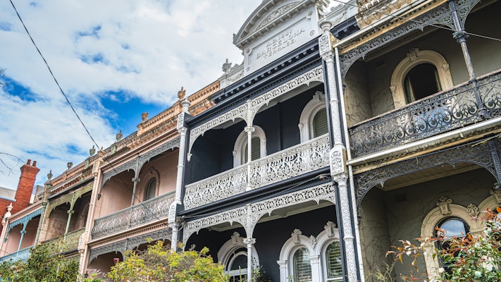 Balconies on town houses with elaborate ironwork in Melbourne.
