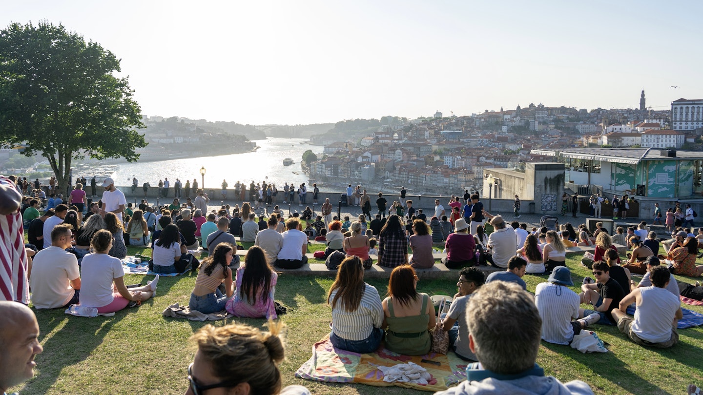 06.22.2023. Porto, Portugal: Many people relaxing in Jardim do Morro over the Douro river .; Shutterstock ID 2366463547; purchase_order: 65050 - Digital Destinations and Articles; job: Lonely Planet Online Editorial; client: Best parks in Porto; other: Brian Healy
2366463547
architecture, background, beautiful, blue, boats, building, cityscape, culture, destination, douro, douro river estuary, europe, event, flower, garden, green, group, hiking, history, holidays, jardim do morro, landmark, landscape, lifestyle, morros garden, natural, nature, old, outdoor, park, people, person, porto, portugal, ribeira, river, season, spring, tourism, tourist, traditional, tranquility, travel, tree, trees, urban, vacation, view, vila nova de gaia, water
Many people relaxing in Jardim do Morro over the Douro river