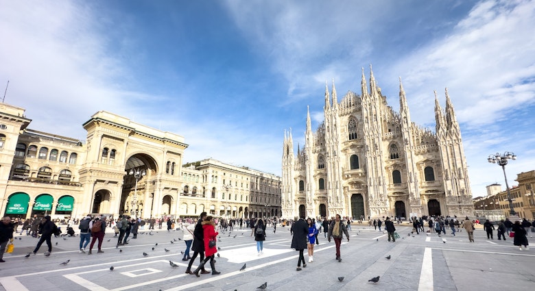 Milan Italy - Jan 22 2024: People walk in the Piazza del Duomo in front of the Duomo di Milano, the catholic cathedral in the city in Italy., License Type: media, Download Time: 2024-12-16T19:01:07.000Z, User: comptonsheldon109, Editorial: true, purchase_order: 56530 - Guidebooks, job: Global Publishing WIP, client: Italian Lakes 4, other: Compton Sheldon