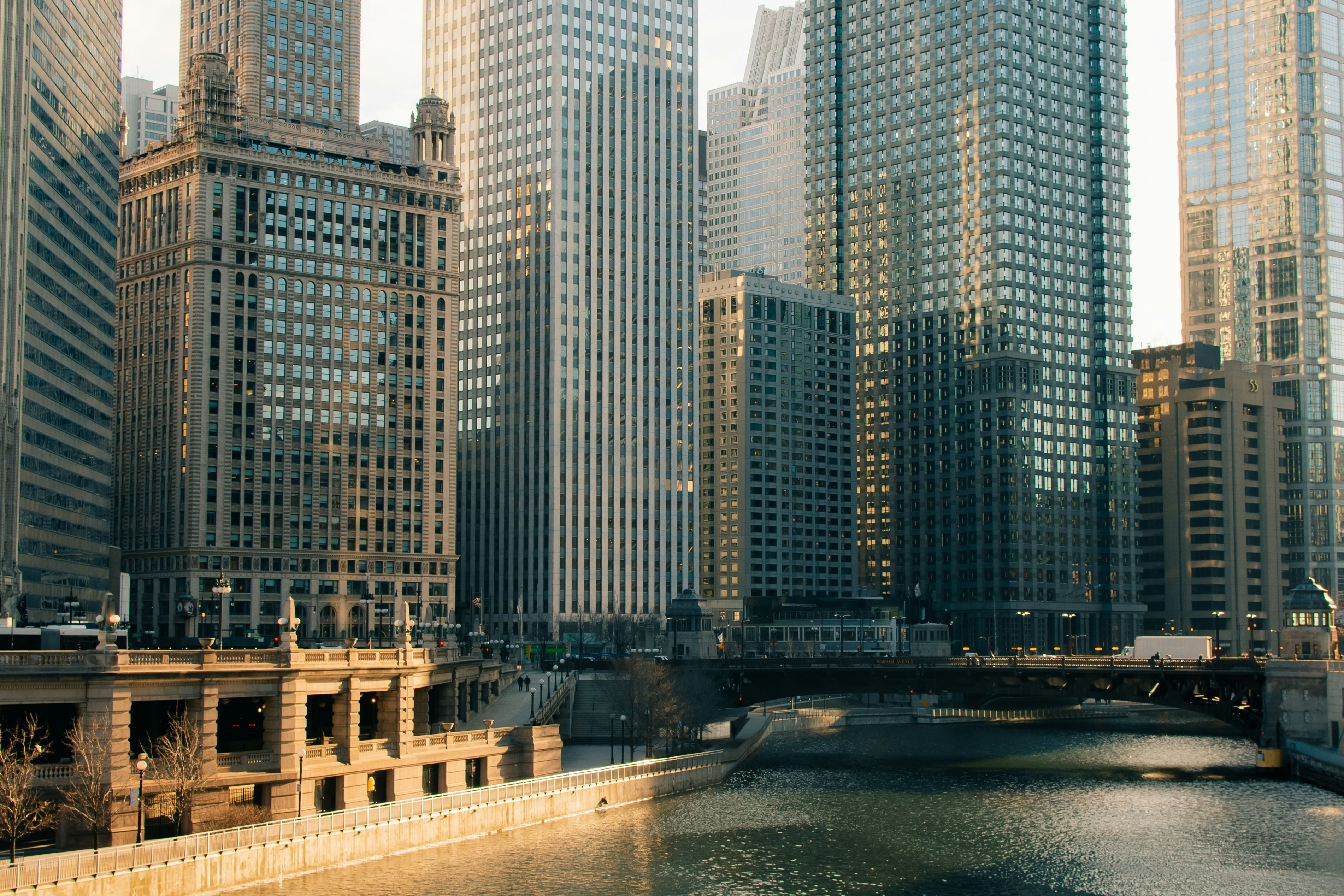 Cityscape of downtown Chicago over the water during sunset
