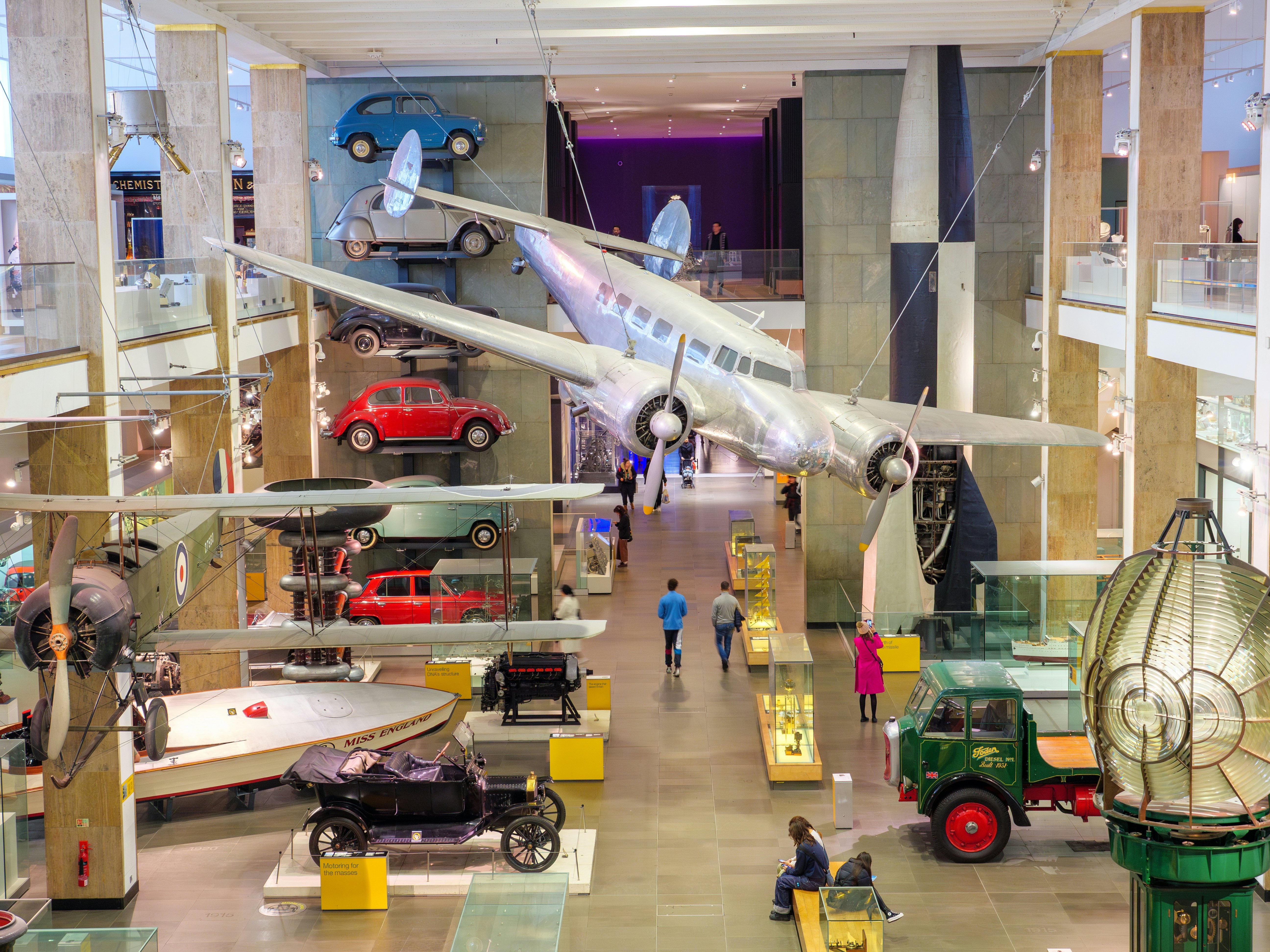 Historic vehicles exhibited inside the Science Museum, London, England.