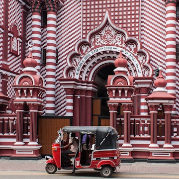 653732554
RFE, Shutterstock, architecture, asia, autorickshaw, building, busy, ceylon, city, colombo, colorful, decoration, district, dome, facade, islam, jami-ul-alfar, landmark, lanka, mosque, muslim, old, pattern, people, pettah, red, religion, sri, street, travel, tuk, urban, Arch, Gothic Arch, Handbag, Hat, Motorcycle, Person, Shoe, Vehicle