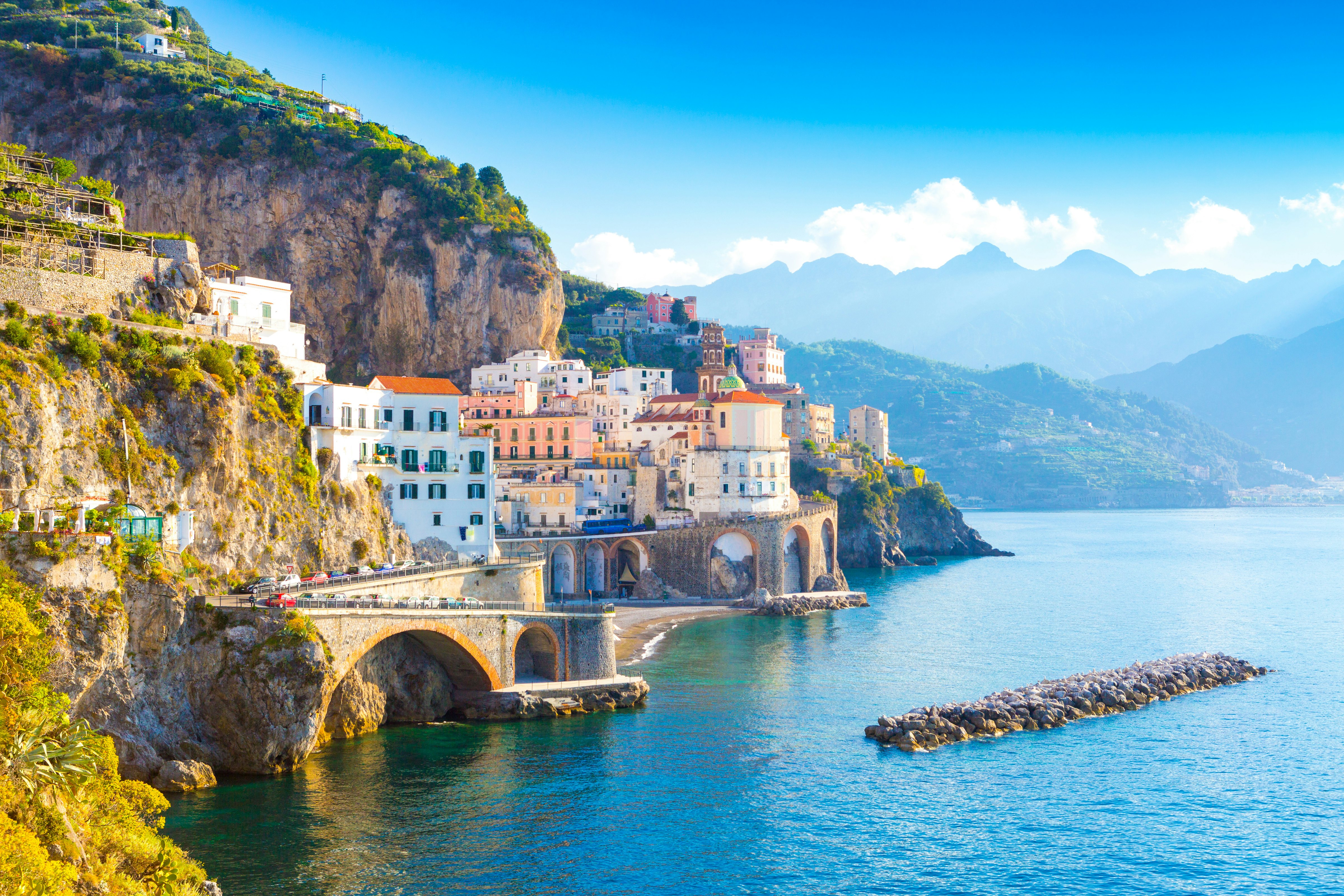 Morning view of Amalfi cityscape on coast line of Mediterranean sea, Italy