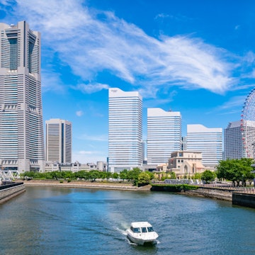 Small boat travels through the water with the cityscape of MinatoMirai in Yokohama City.
1126658477
architecture, area, bashamichi, bay, beautiful, blue, boat, building, business, canal, city, cityscape, coast, downtown, ferris, harbor, japan, japanese, kanagawa, kannai, landmark, metropolis, minatomirai, modern, office, panorama, place, port, prefecture, river, sakuragicho, scene, scenery, scenic, shore, sky, skyline, skyscraper, structure, tour, tourist, tower, town, travel, urban, view, water, waterfront, wheel, yokohama