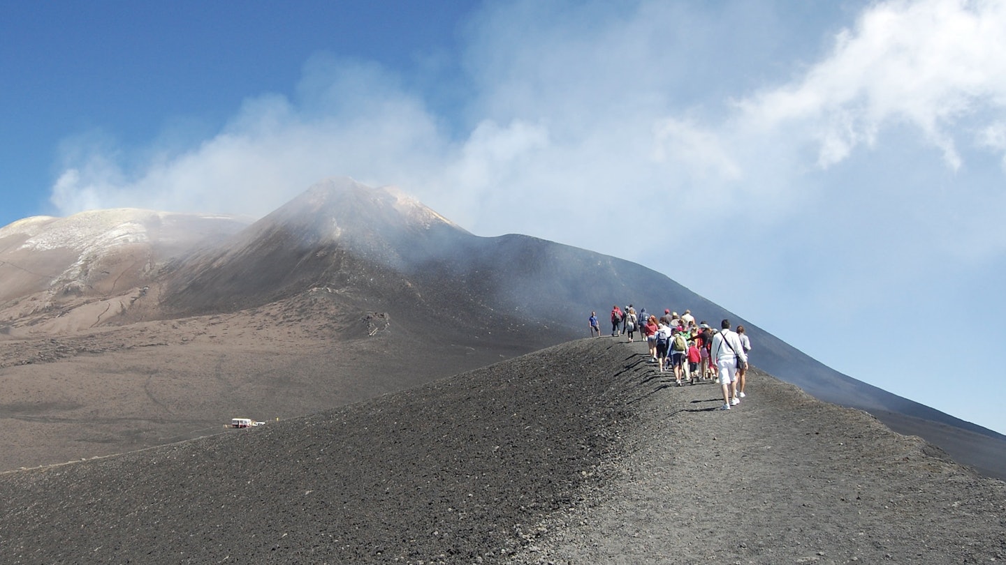 Climbing a smoking Mt Etna, Sicily, Italy
85769542
RFC, Shutterstock, view, rock, lava, blue, etna, cloud, italy, mount, smoke, travel, scenic, nature, sicily, europe, italian, scenery, tourism, volcano, sicilian, eruption, mountain, vacation, landscape, mediterranean, Adventure, Gravel, Hiking, Mountain, Mountain Range, Nature, Outdoors, Peak, Person, Plateau, Road, Scenery
Climbing a smoking Mt Etna, Sicily, Italy