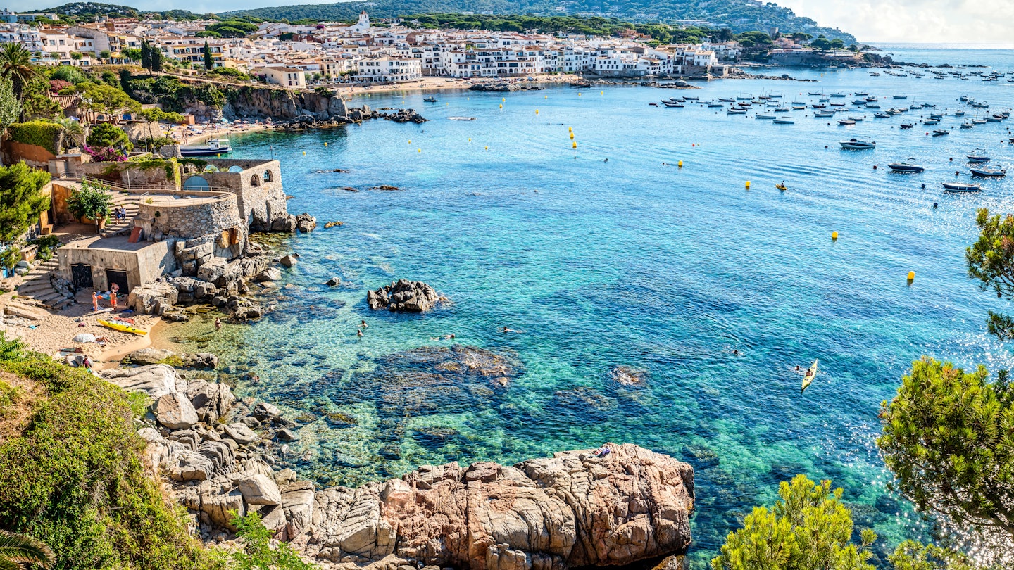 Panoramic view of Calella de Palafrugell old village in a summer morning with a blue sea and sky with a lot of little boats parked in front. Costa Brava, Girona province, Catalonia. Spain
1436041067
Costa Brava seaside town Calella de Palafrugell in Girona Province, Catalonia. Spain - stock photo
Panoramic view of Calella de Palafrugell old village in a summer morning with a blue sea and sky with a lot of little boats parked in front. Costa Brava, Girona province, Catalonia. Spain