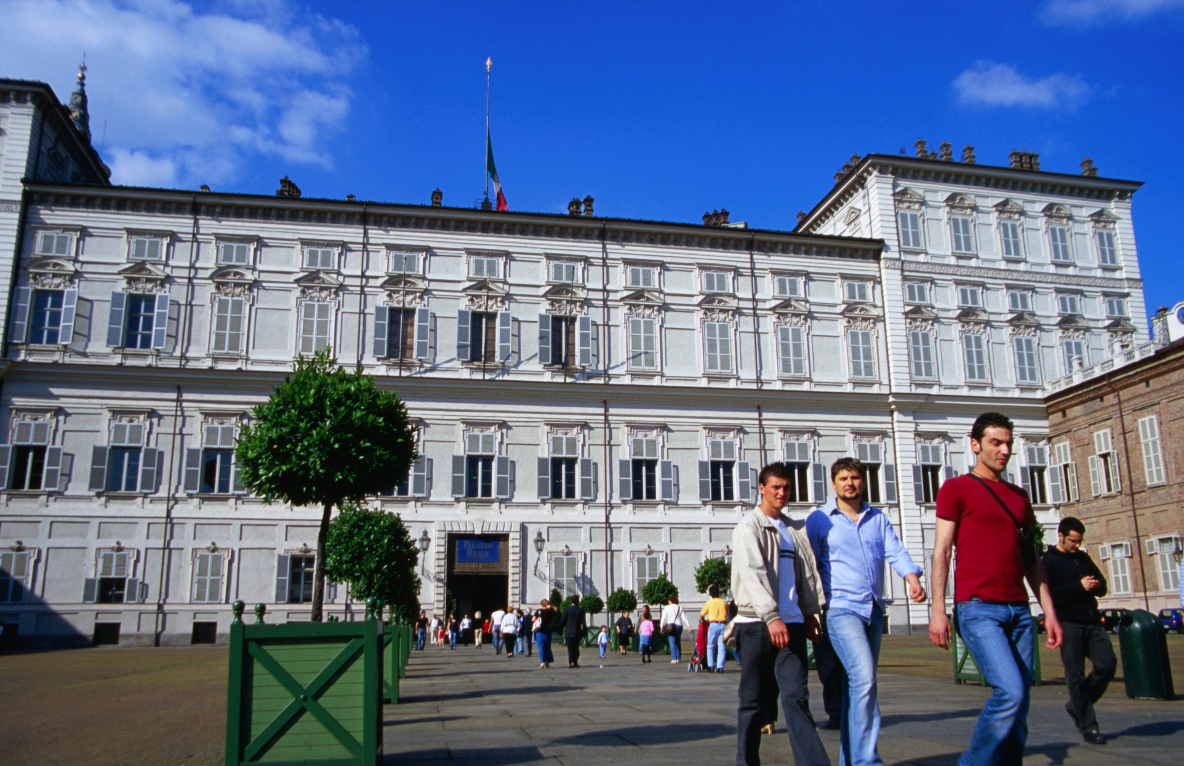 People walking outside the Palazzo Reale