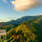 The Blue Mountains, Jamaica, Dec 2018, Strawberry Hill Hotel house at sunset License Type: media Download Time: 2023-08-12T14:44:35.000Z User: Eointloughney87 Is Editorial: Yes purchase_order: