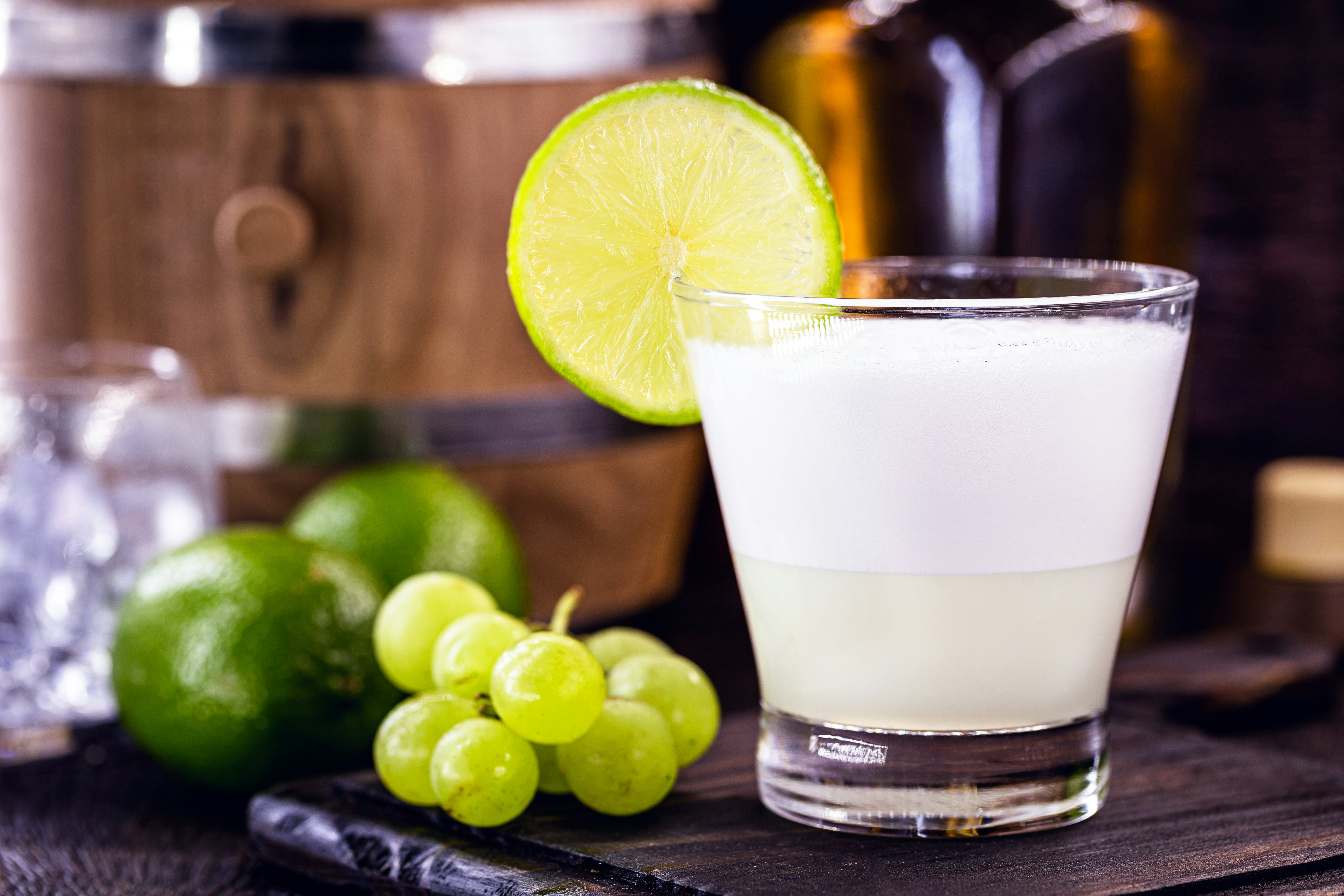 Pisco sour, a typical cocktail of South American cuisine, based on pisco and lemon, sweetened with brandy, eggs, served cold