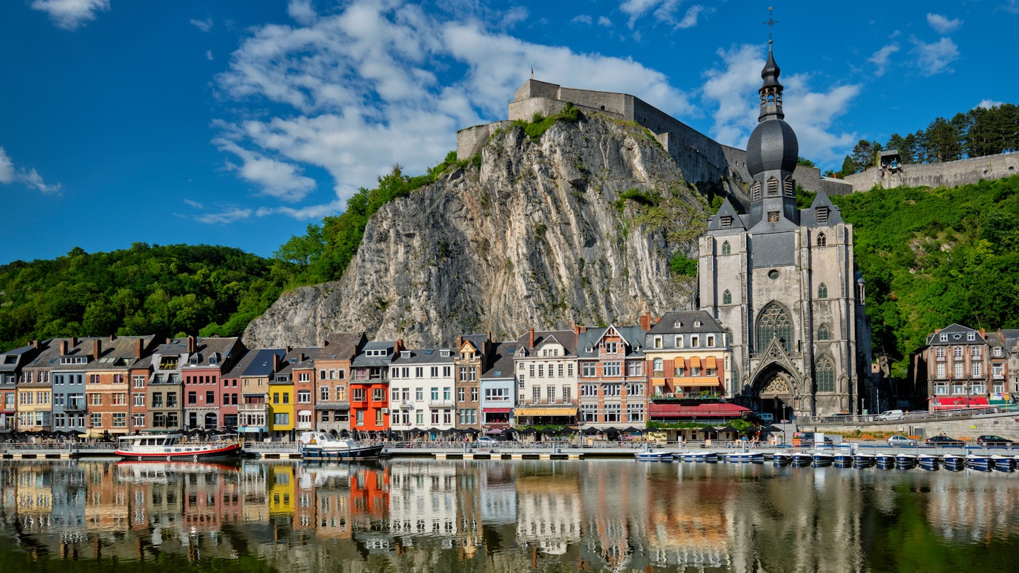 View of picturesque Dinant town, Dinant Citadel and Collegiate Church of Notre Dame de Dinant over the Meuse river. Belgian province of Namur, Blegium License Type: media Download Time: 2024-05-22T09:36:31.000Z User: clairenaylor Is Editorial: No purchase_order: