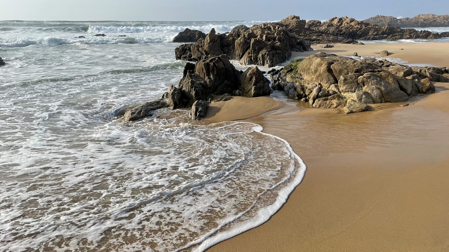 Stunning view of sandy beach with yellow rocks and Atlantic ocean in Matosinhos Beach in Portugal License Type: media Download Time: 2022-06-14T19:54:15.000Z User: Is Editorial: No purchase_order: